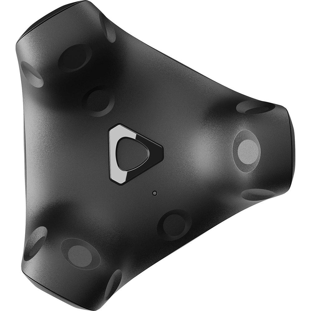 Controller VR nero e triangolare con logo argentato e sensori circolari.
