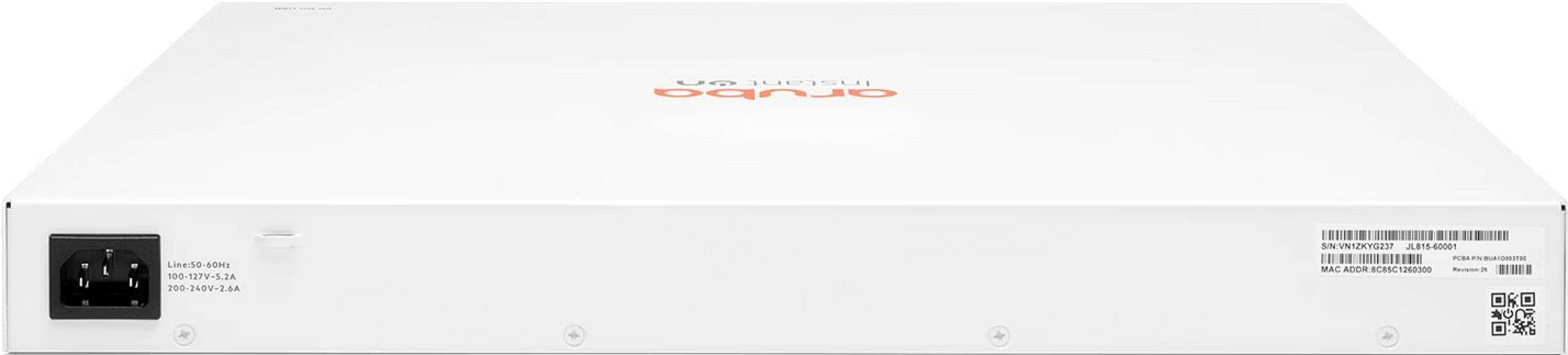 Back of a white Aruba network device with power port and labels.