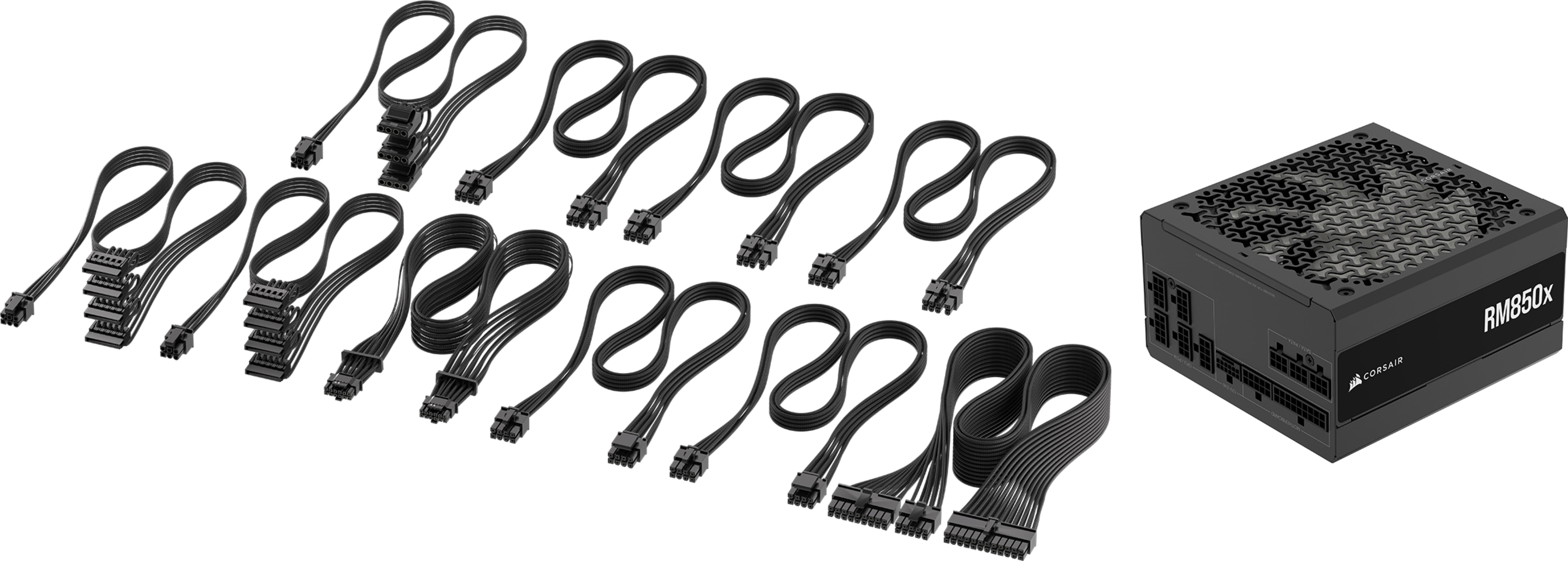 Czarny zasilacz z wieloma czarnymi kablami. Zasilacz oznaczony jest jako RM850x.
