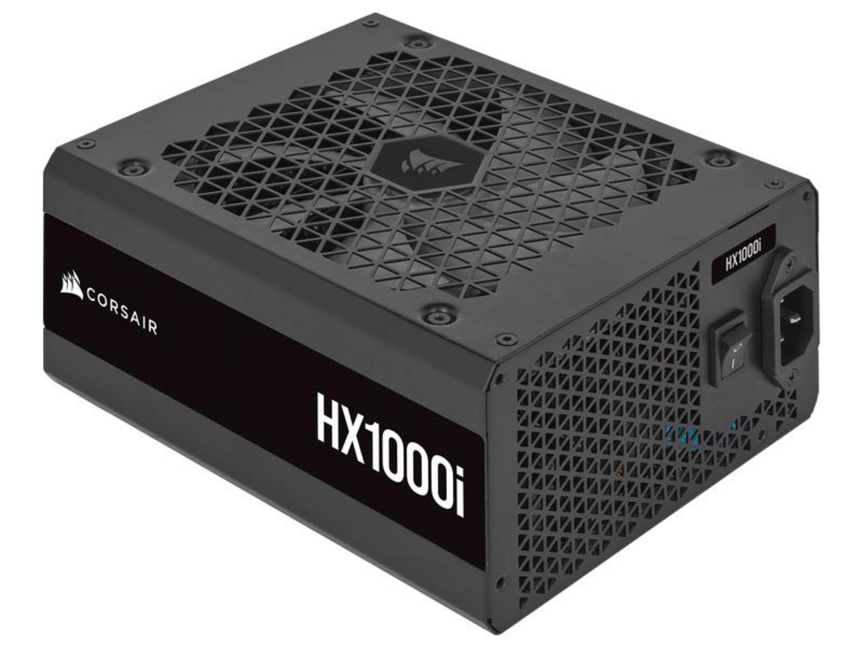 Czarny zasilacz Corsair HX1000i z kratką wentylacyjną i przełącznikiem.