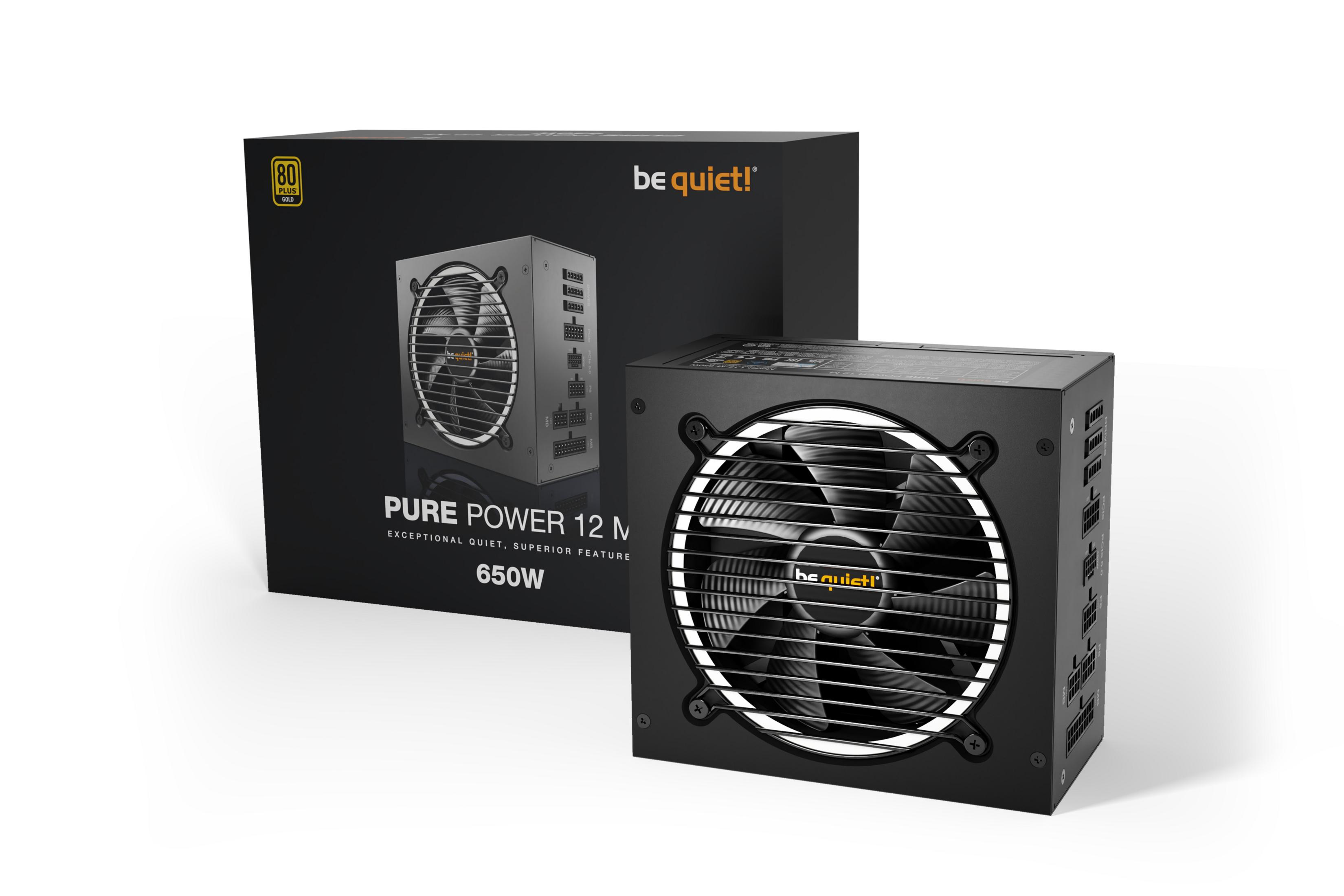 Una fuente de alimentación negra de 650W con certificación 80 Plus Gold junto a su caja.