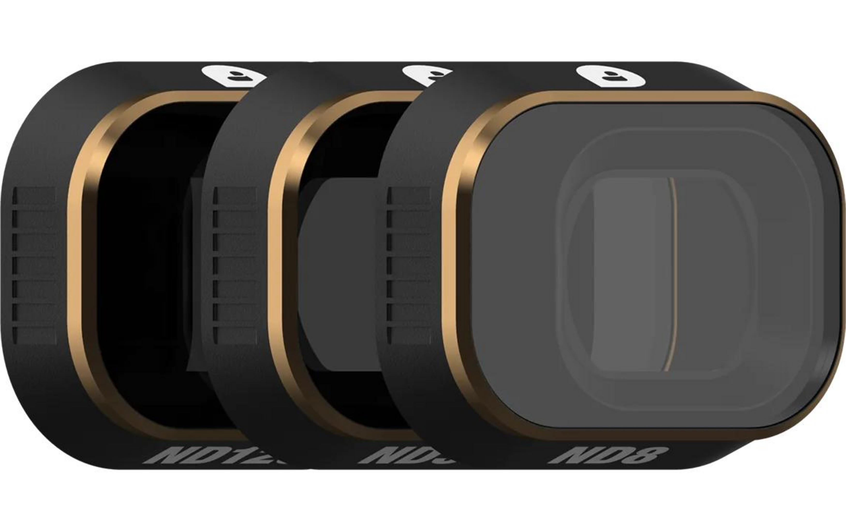 Trzy prostokątne czarne filtry ze złotymi ramkami, ustawione obok siebie.