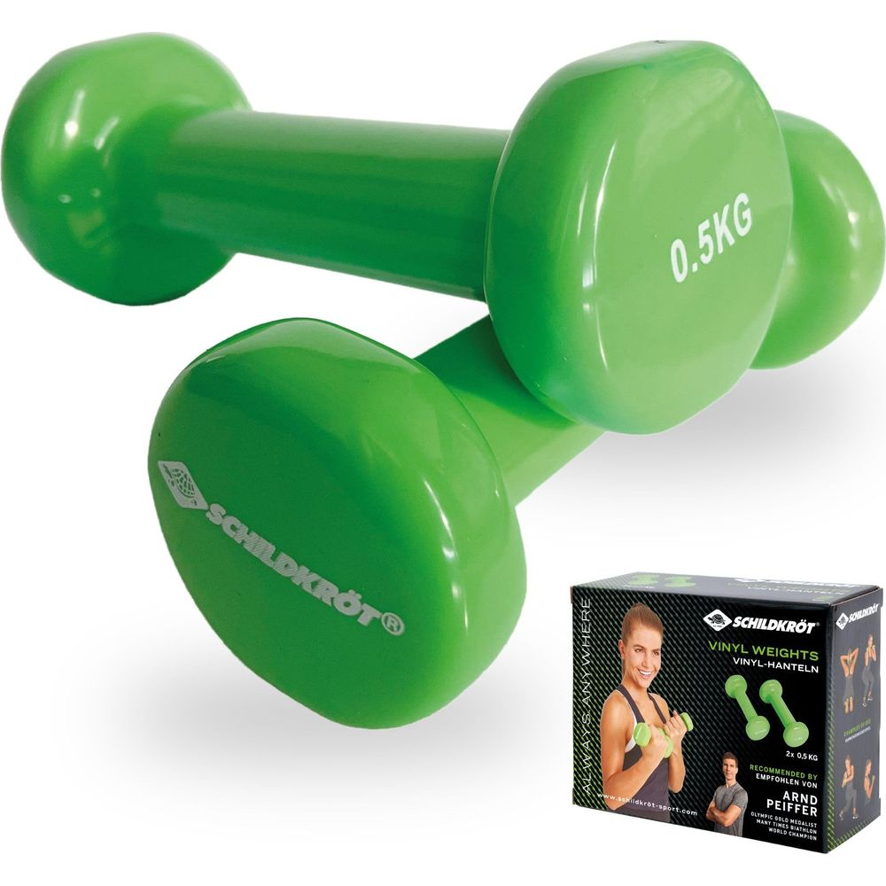 Zwei grüne Hanteln mit 0,5 kg und eine Schachtel mit Produktinformationen.