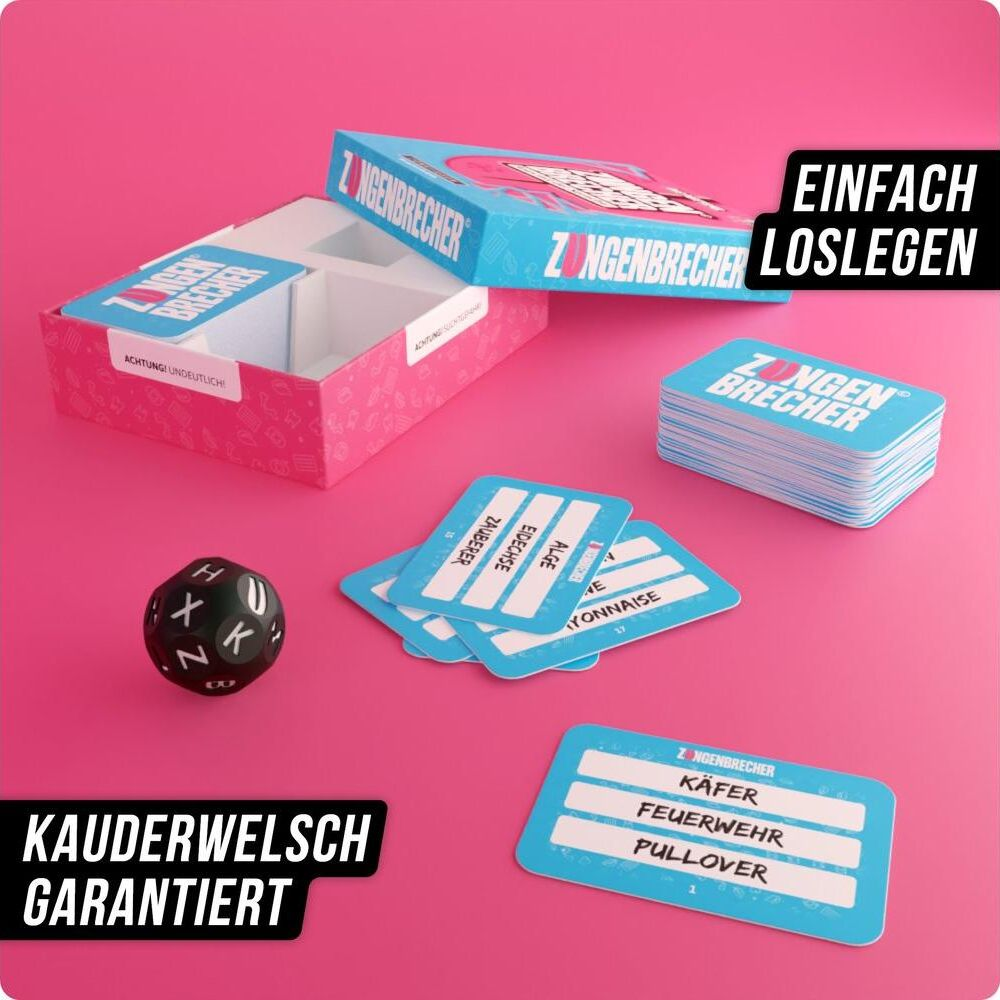 Ein Spiel "Zungenbrecher" mit Karten, Würfel und Box auf pinkem Hintergrund.
