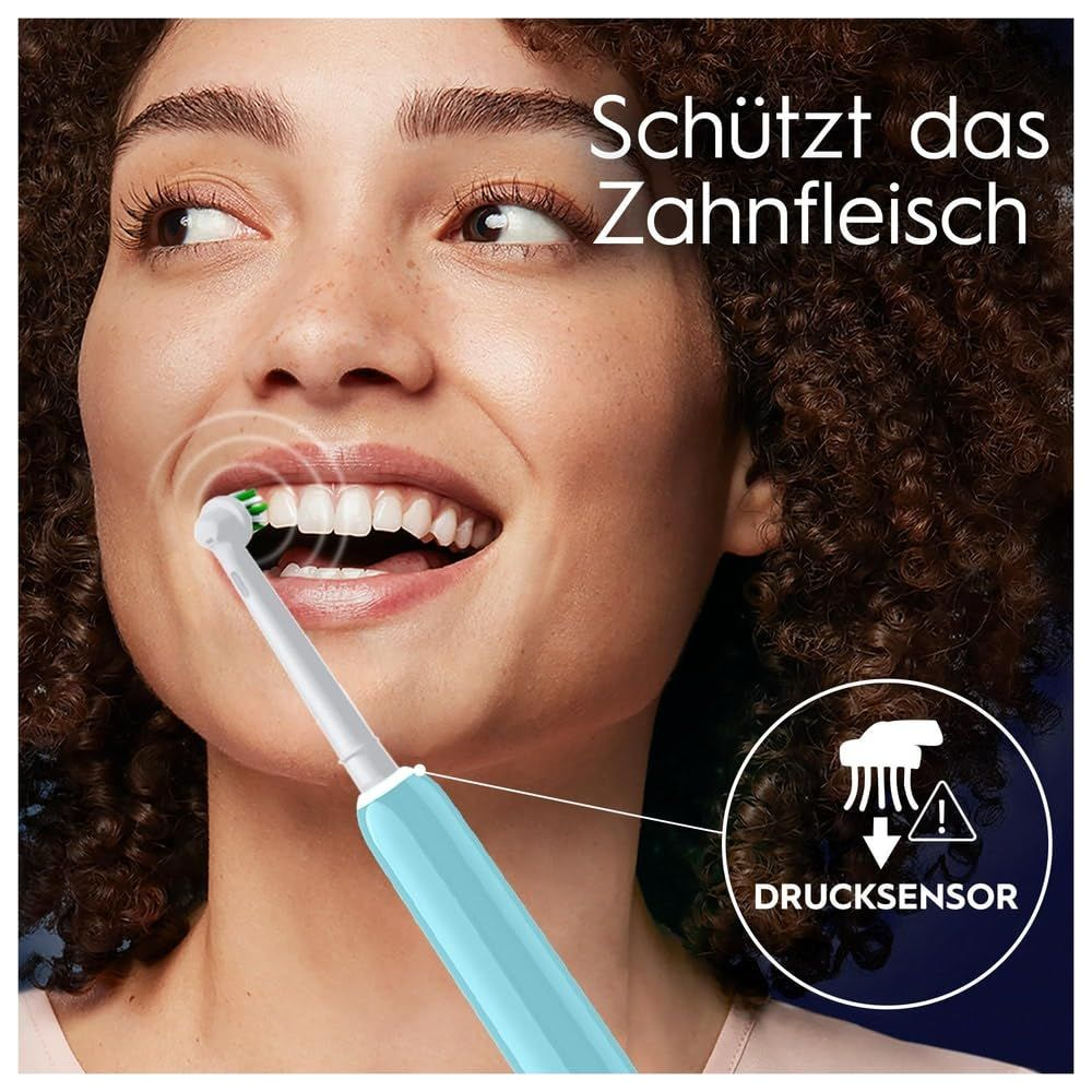 Donna lava denti con spazzolino elettrico, sensore pressione.