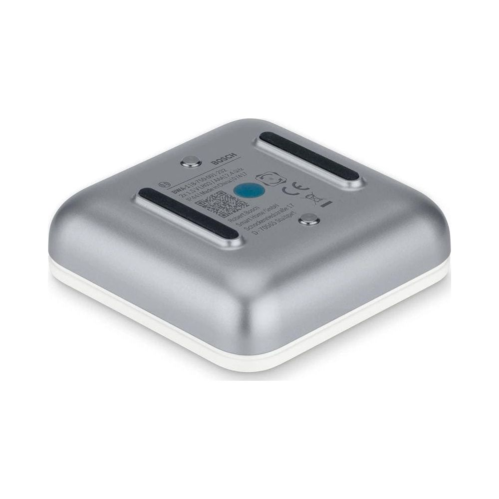 Srebrne urządzenie Bosch z napisami i gumowymi nóżkami.