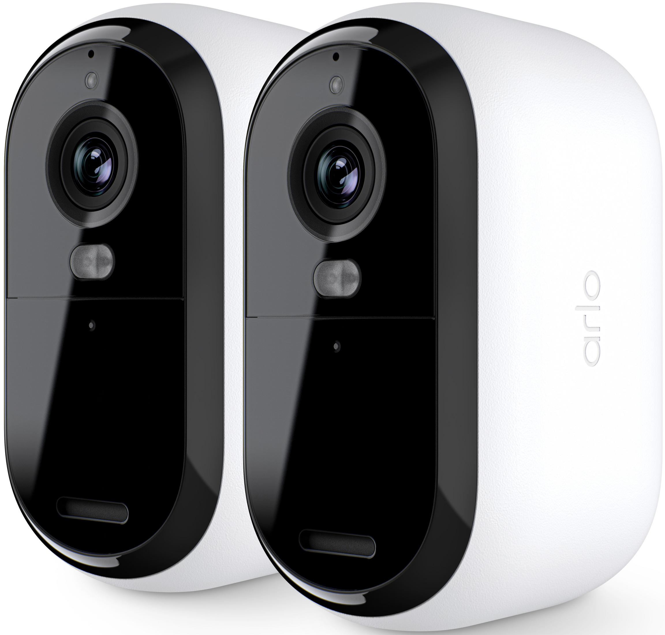Pokazano dwie białe kamery bezpieczeństwa Arlo z czarnymi frontami i obiektywami.