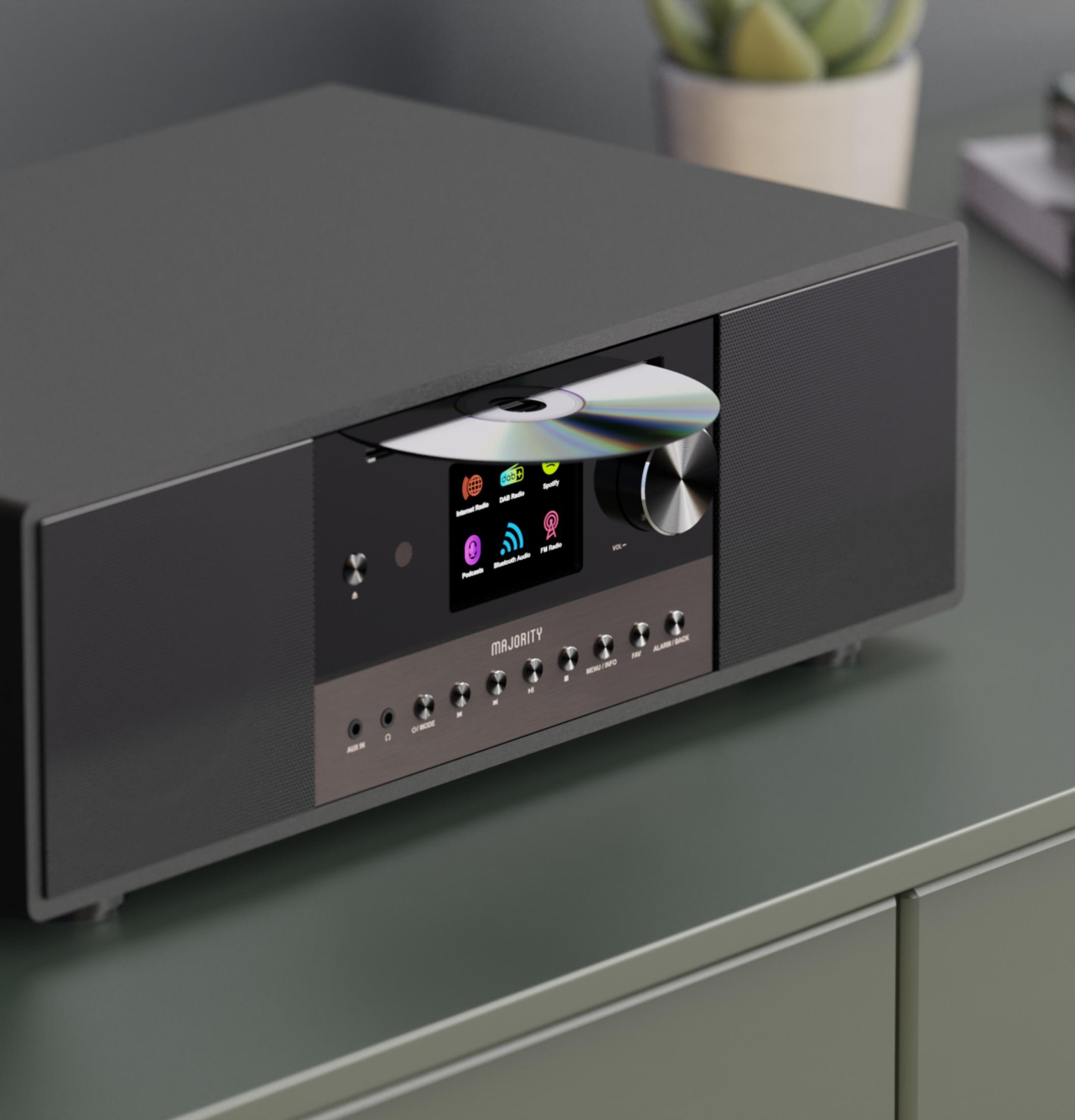 Een grijs multifunctioneel audiosysteem met cd-sleuf, display en knoppen.
