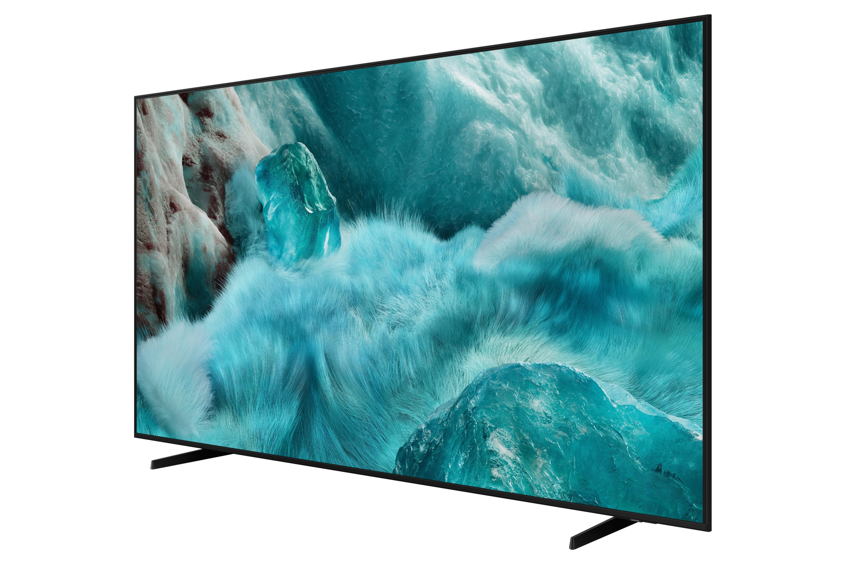 Ein schlanker schwarzer Fernseher steht vor einem eisblauen, pelzigen Hintergrund mit eisigen Felsen.