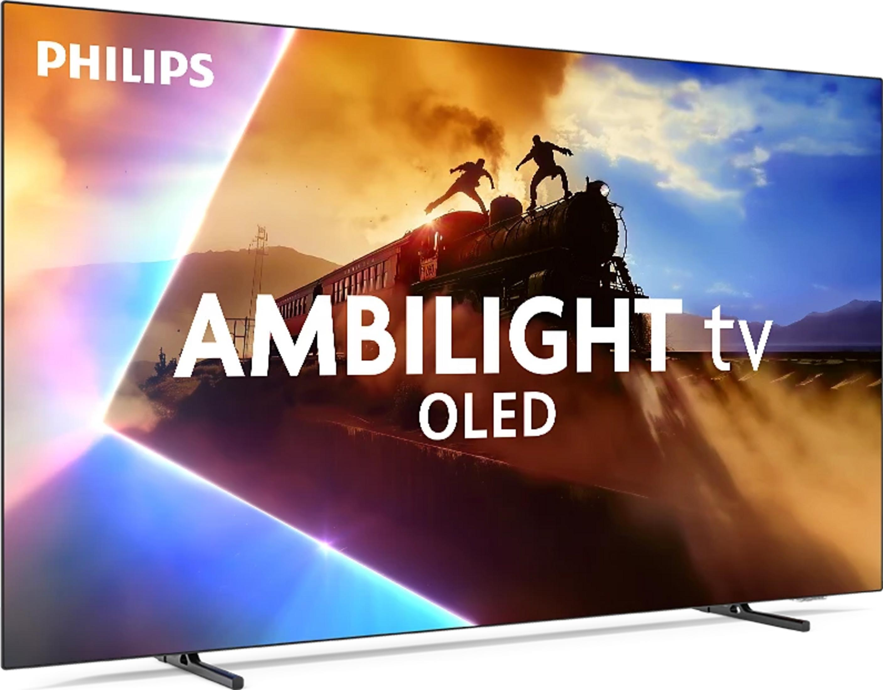 Telewizor Philips wyświetla lokomotywę parową z sylwetkami i napis AMBILIGHT tv OLED.