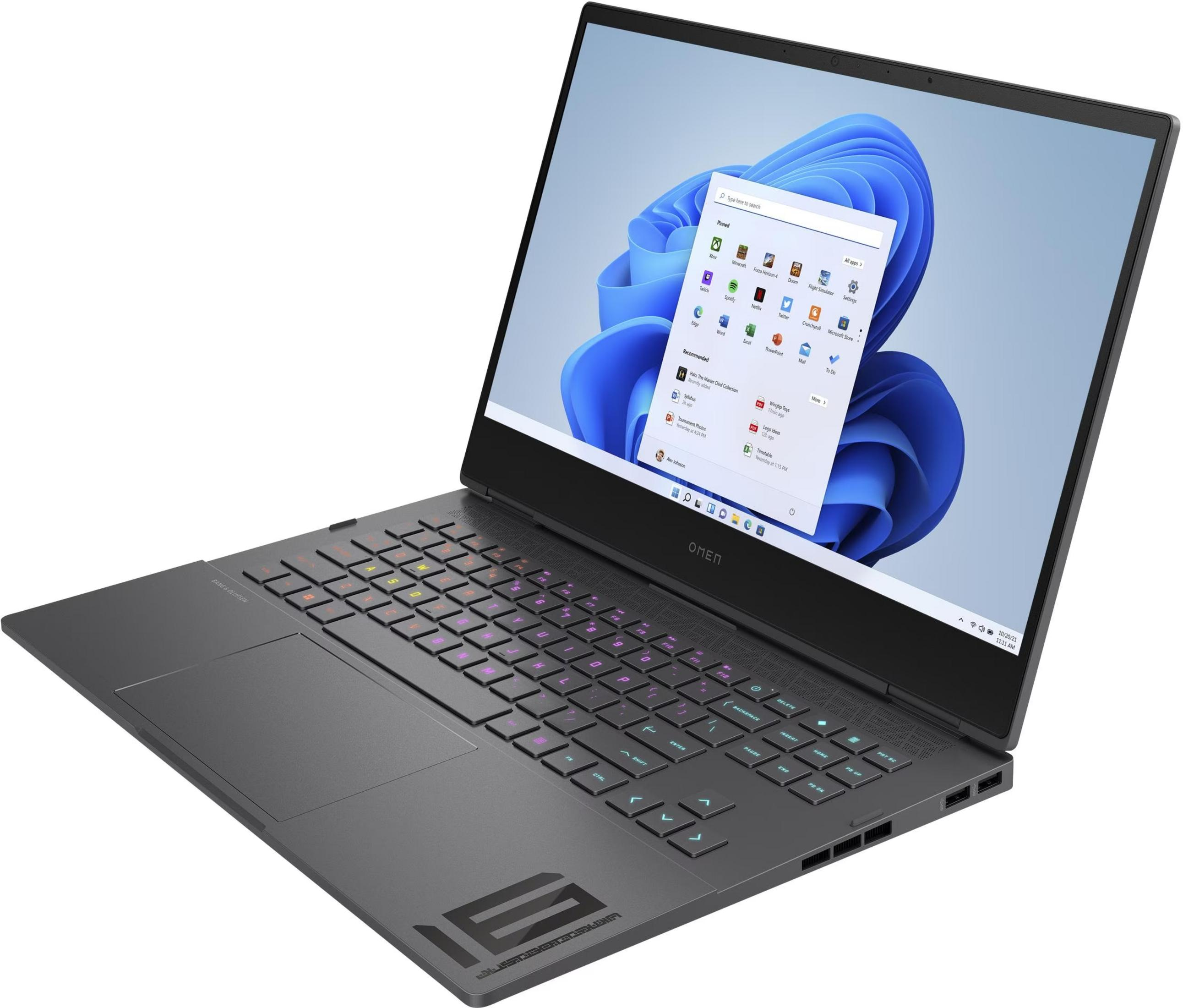 Ein dunkler Laptop mit beleuchteter Tastatur und Windows 11-Startmenü auf dem Bildschirm.
