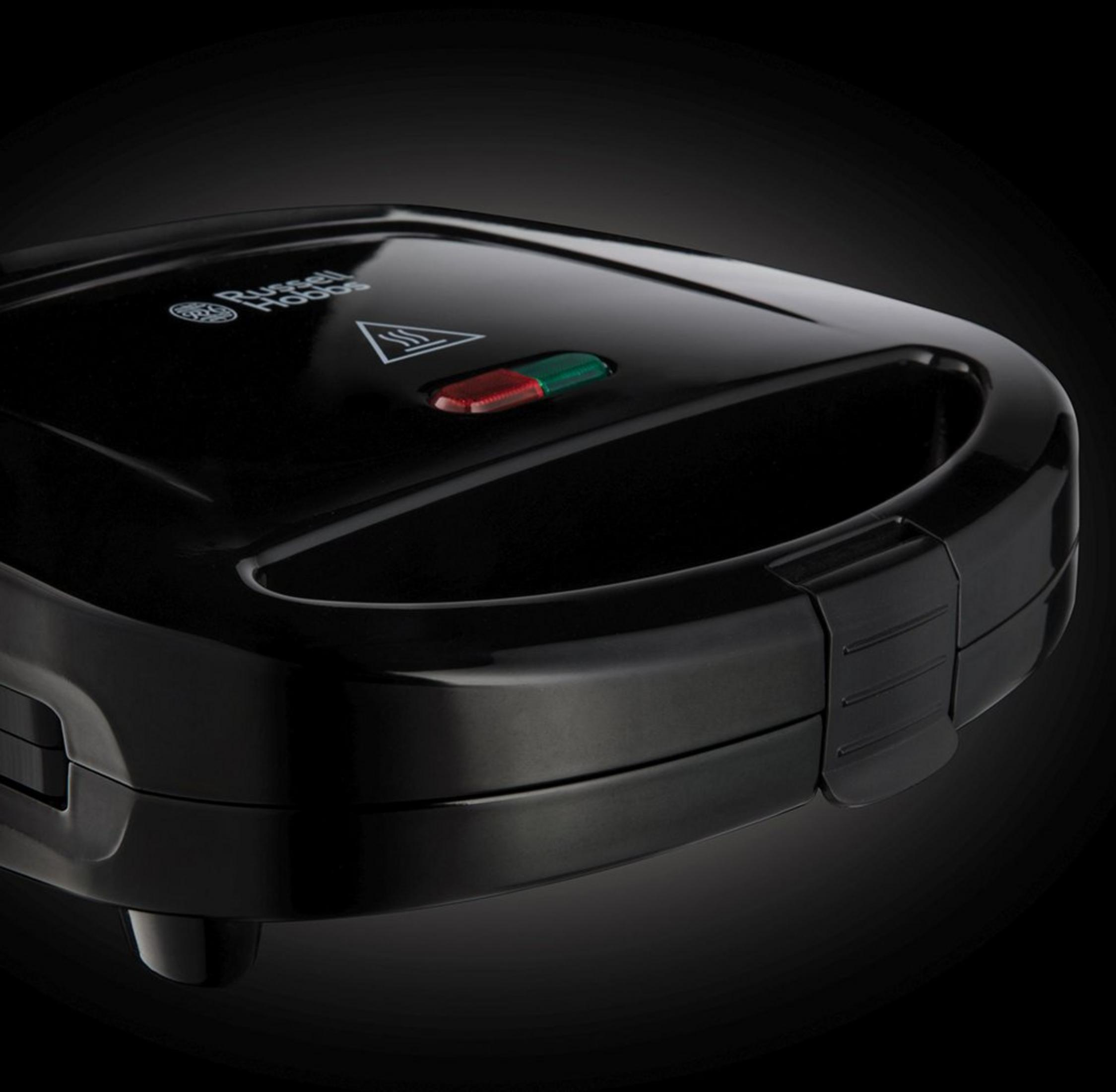 Schwarzer Sandwichmaker mit Russell Hobbs Logo und Lichter.