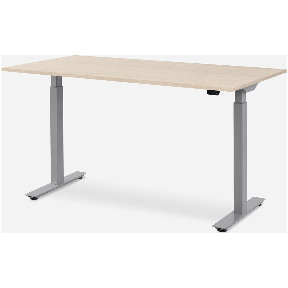 Ein heller Schreibtisch mit grauen Beinen und einer Holzplatte.