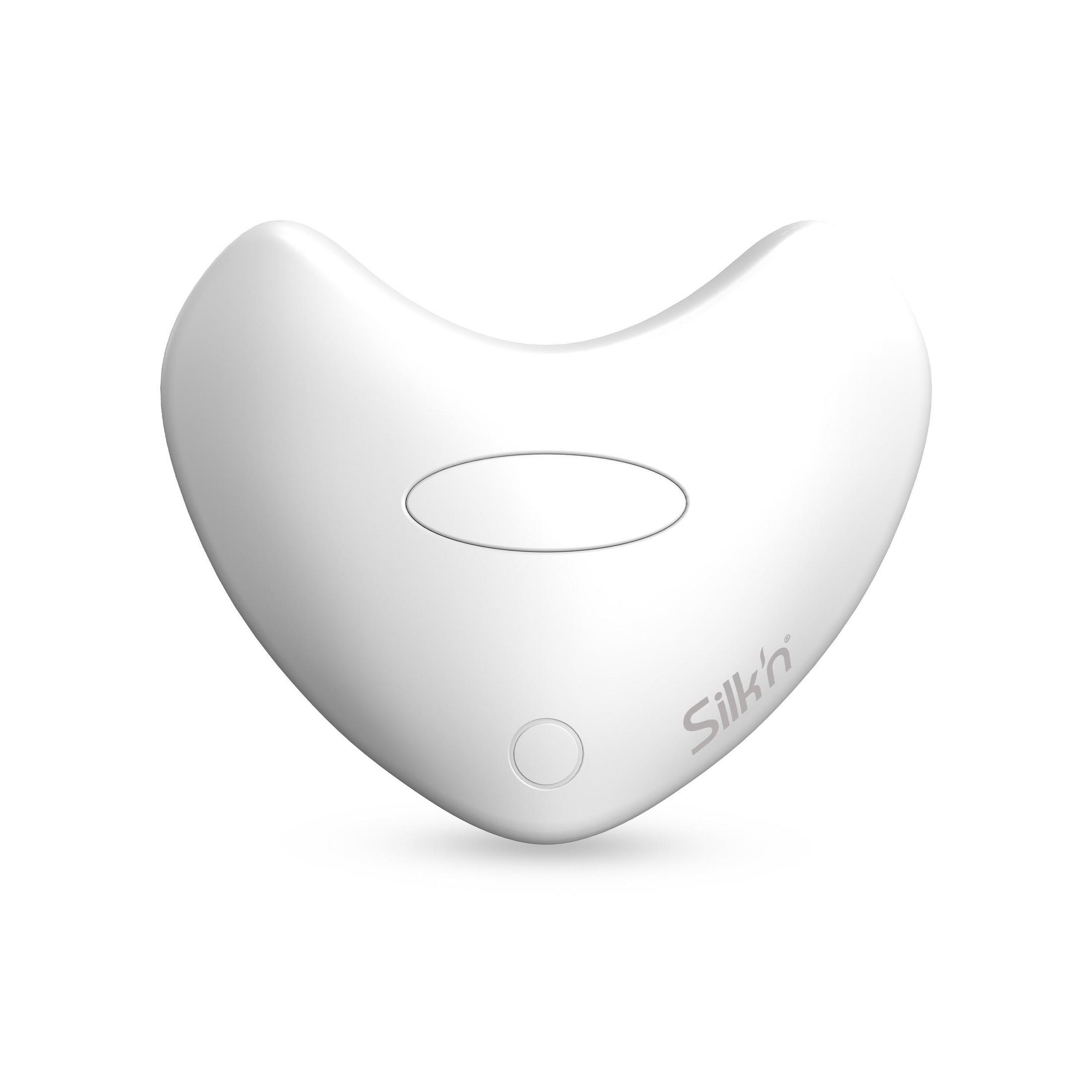 Un dispositivo bianco a forma di cuore con un pulsante ovale e uno rotondo.
