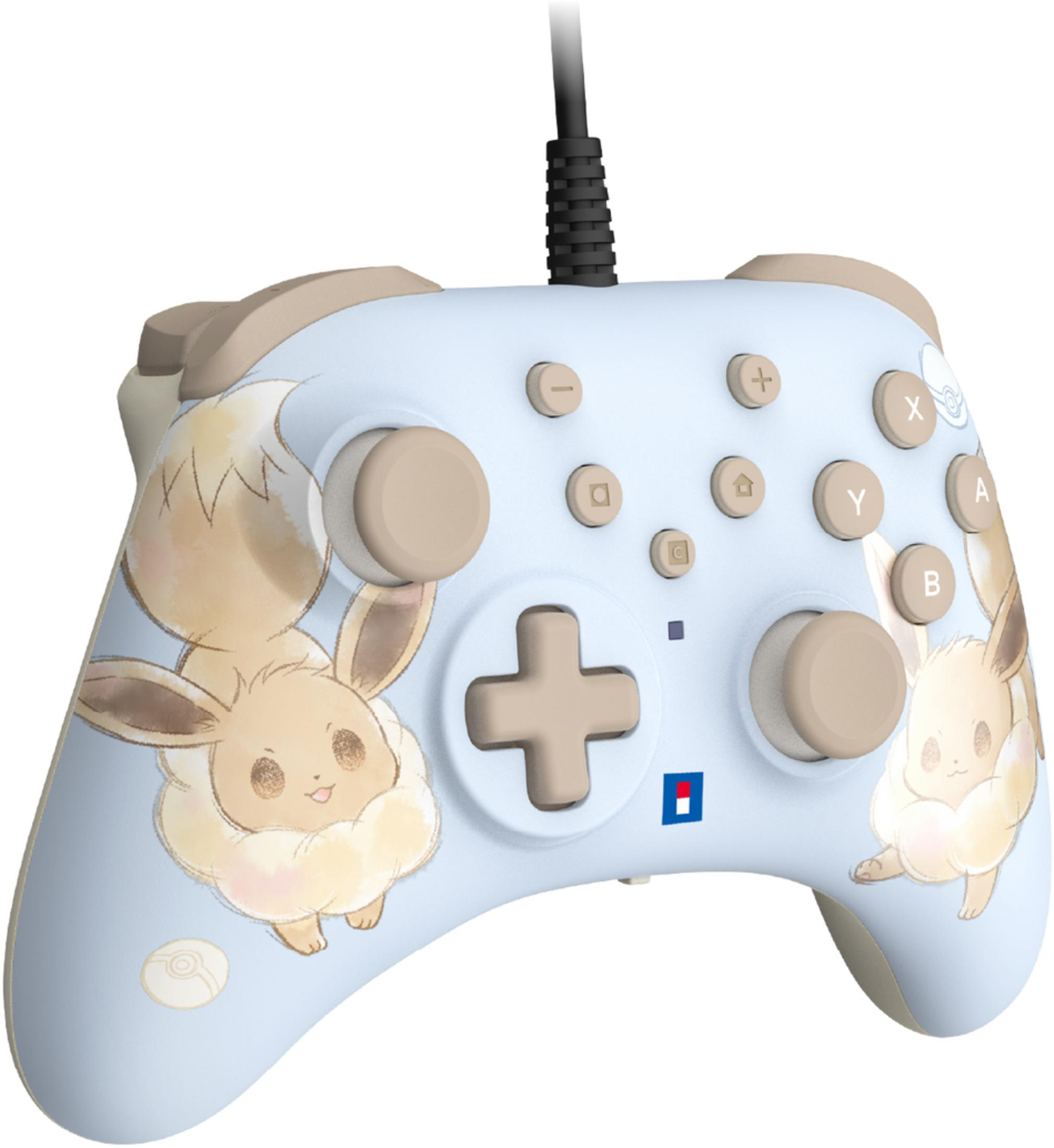 Jasnoniebieski gamepad z postaciami Eevee i brązowymi przyciskami.