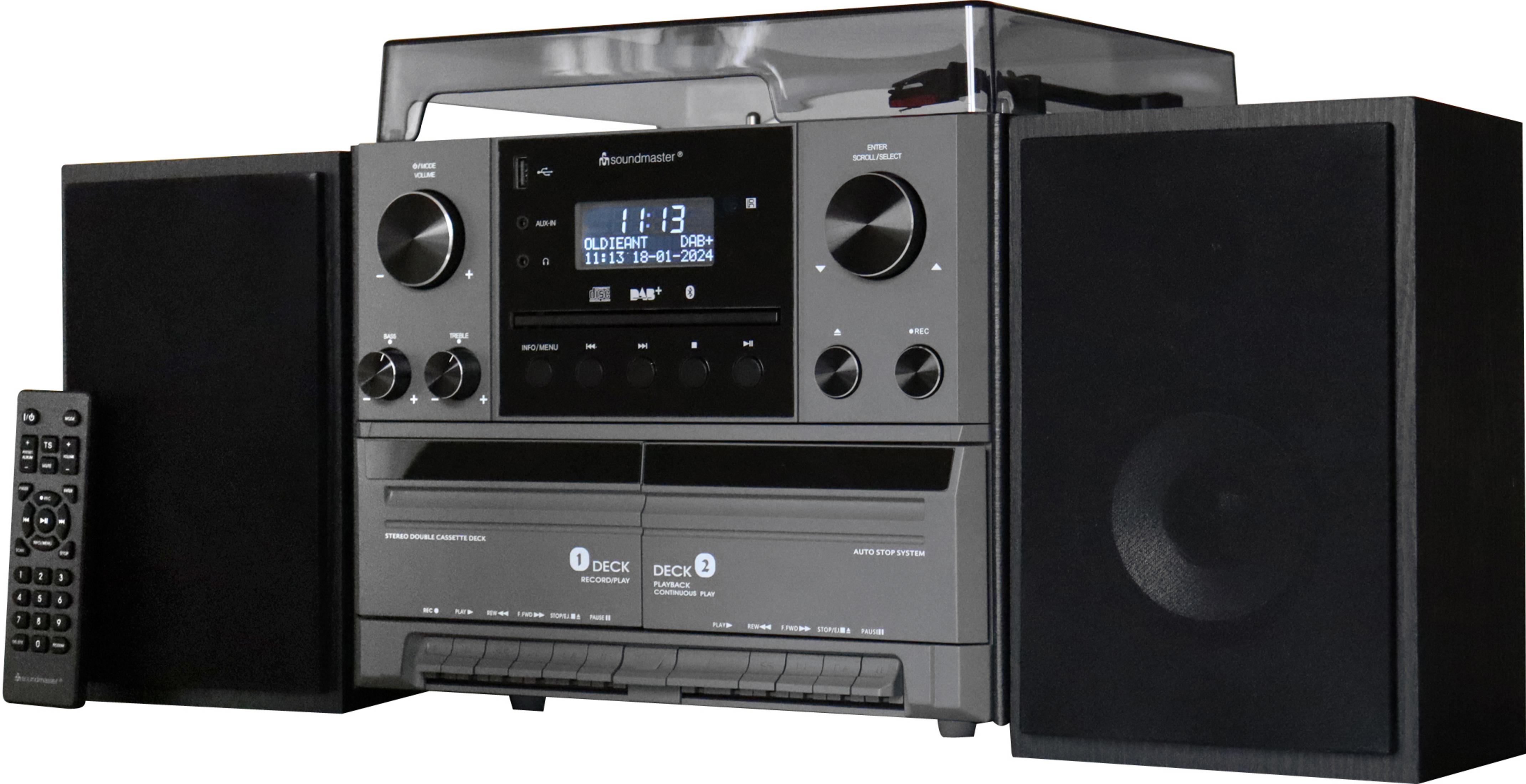 Ein graues Soundmaster-Stereosystem mit Plattenspieler, CD-Player, Kassettendeck und Fernbedienung.