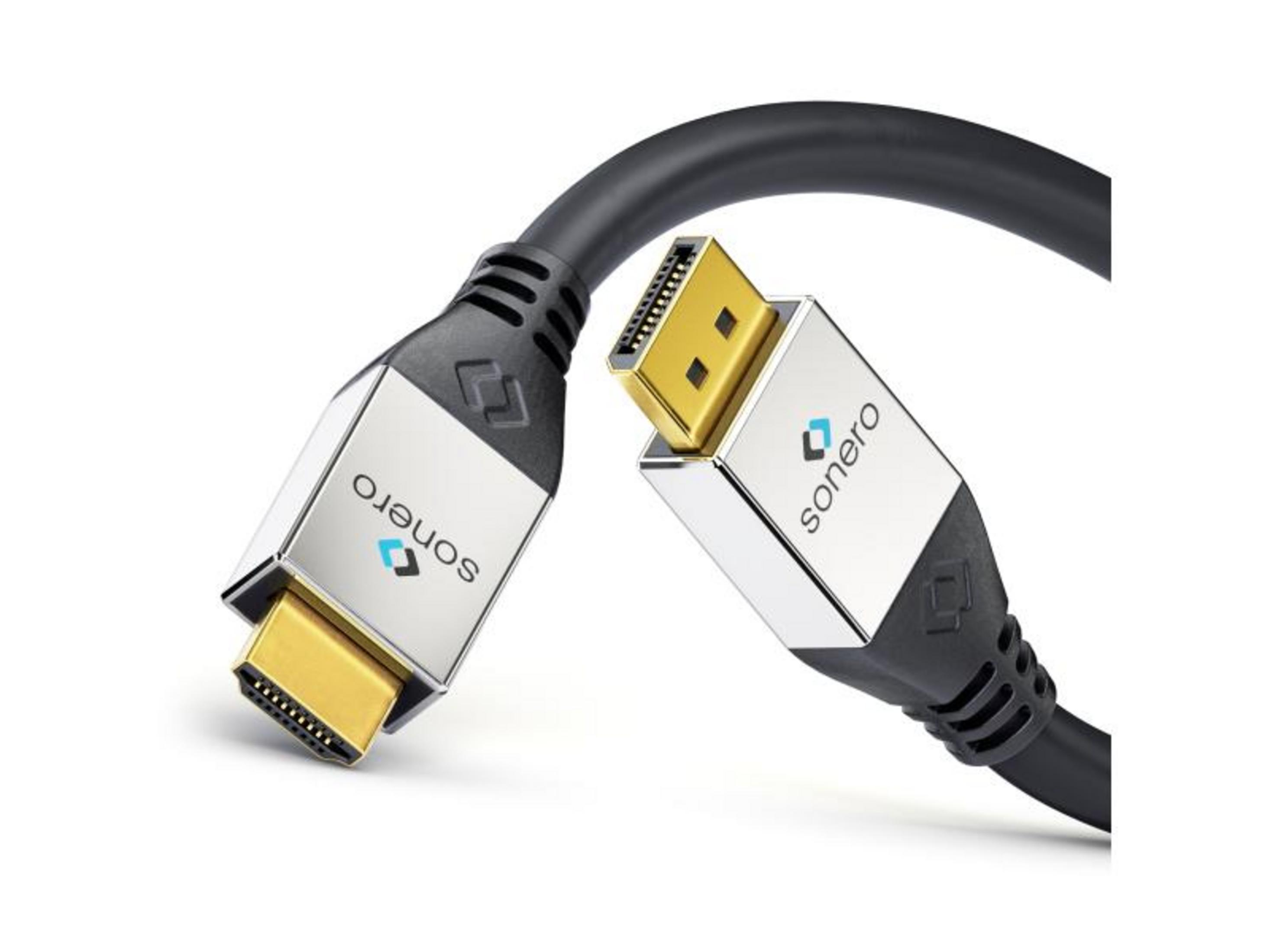 Ein schwarzes Kabel mit zwei vergoldeten Steckern mit silbernen Gehäusen.