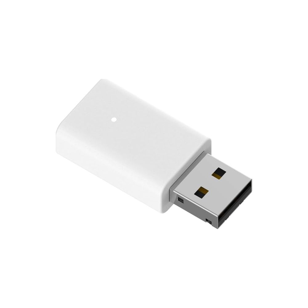 A white USB adapter with a visible plug. A small dot is illuminated.