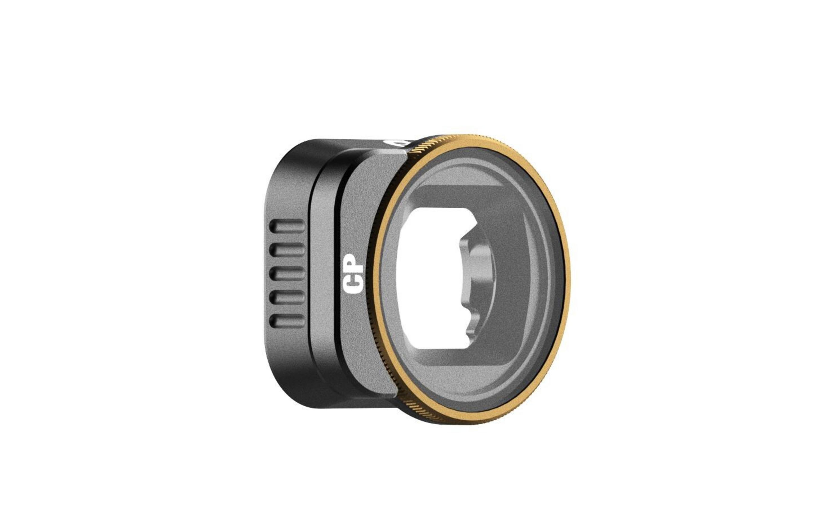 Szary filtr obiektywu ze złotą obwódką i rowkami. Z etykietą 'CP'.