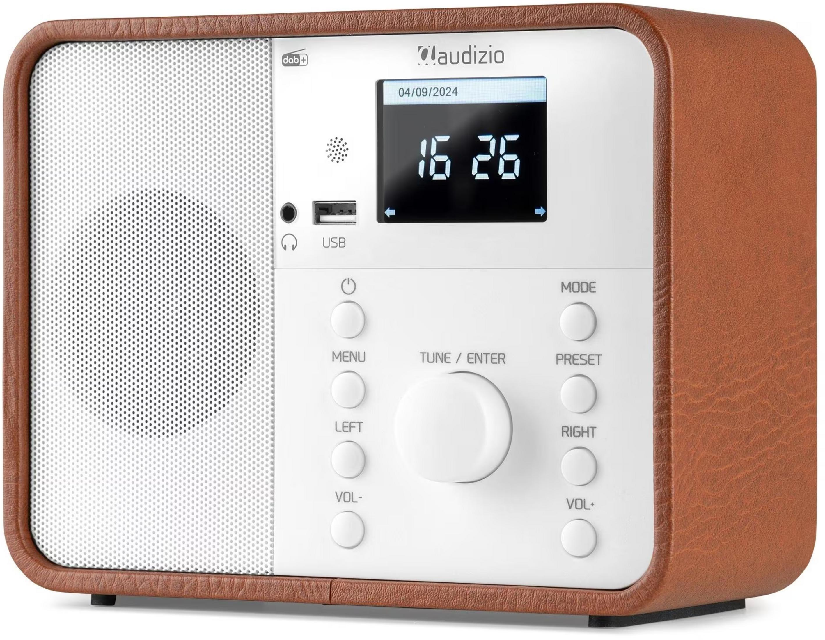 Una radio marrón con rejilla de altavoz blanca y pantalla digital.