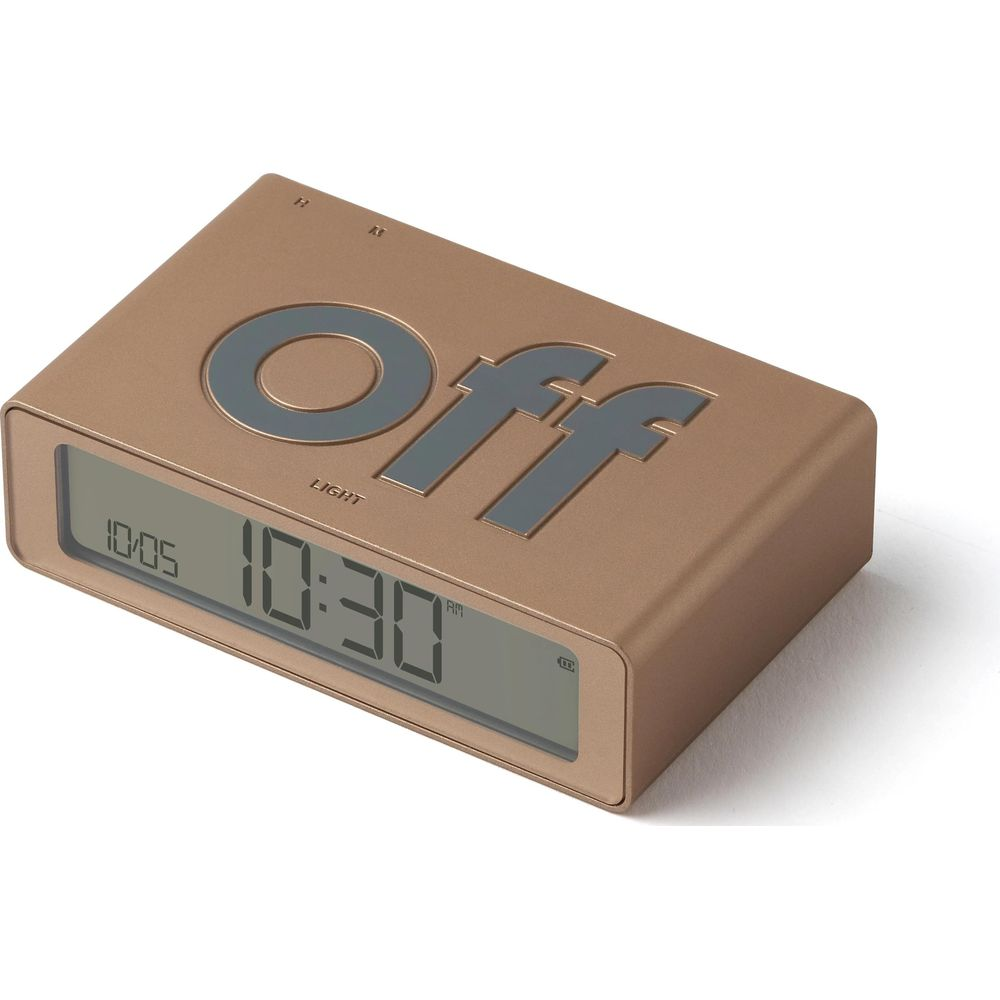 Ein bronzefarbener digitaler Wecker mit der Aufschrift "OFF" und einer Zeit von 10:30.