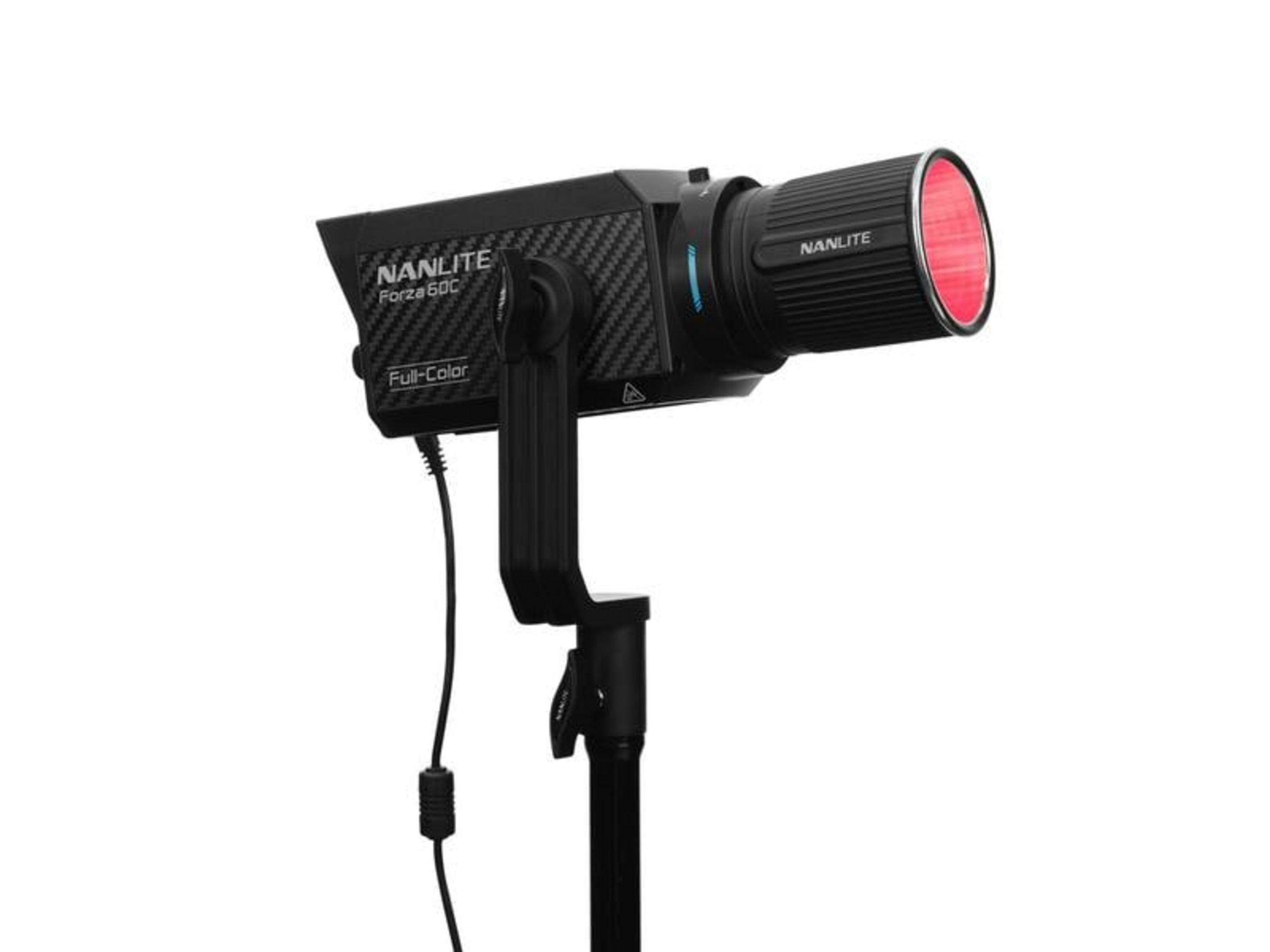 A black Nanlite Forza 60C light with a red reflector, mounted on a stand.