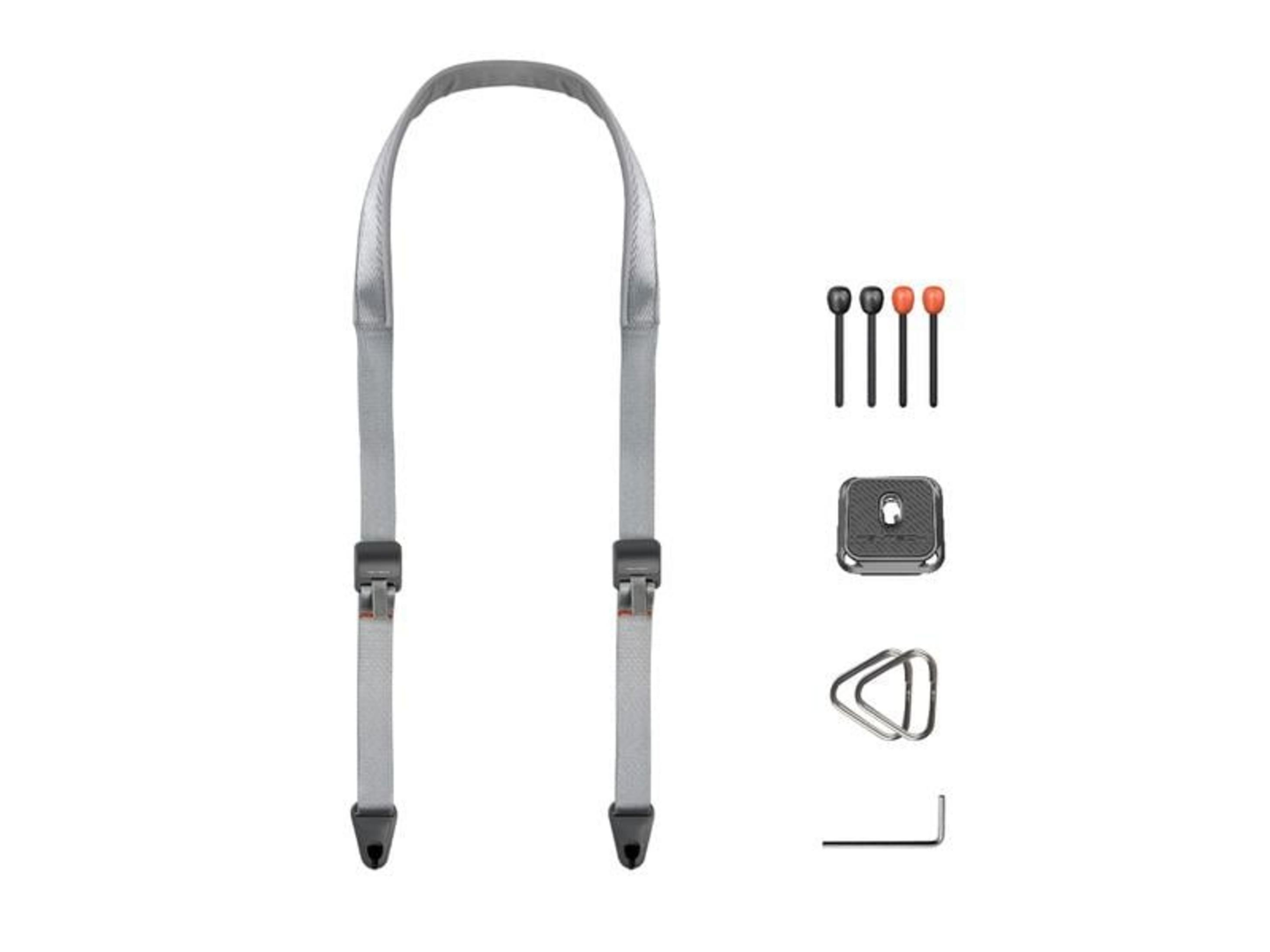 Szara smycz do aparatu z akcesoriami: bolce, płytka, pierścień, klucz imbusowy.