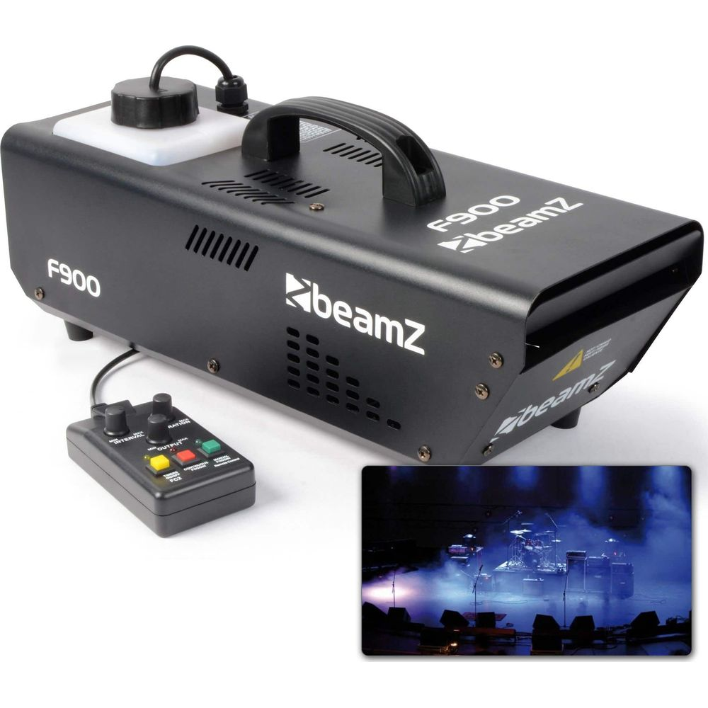 Máquina de humo negra con control remoto y escena de escenario.
