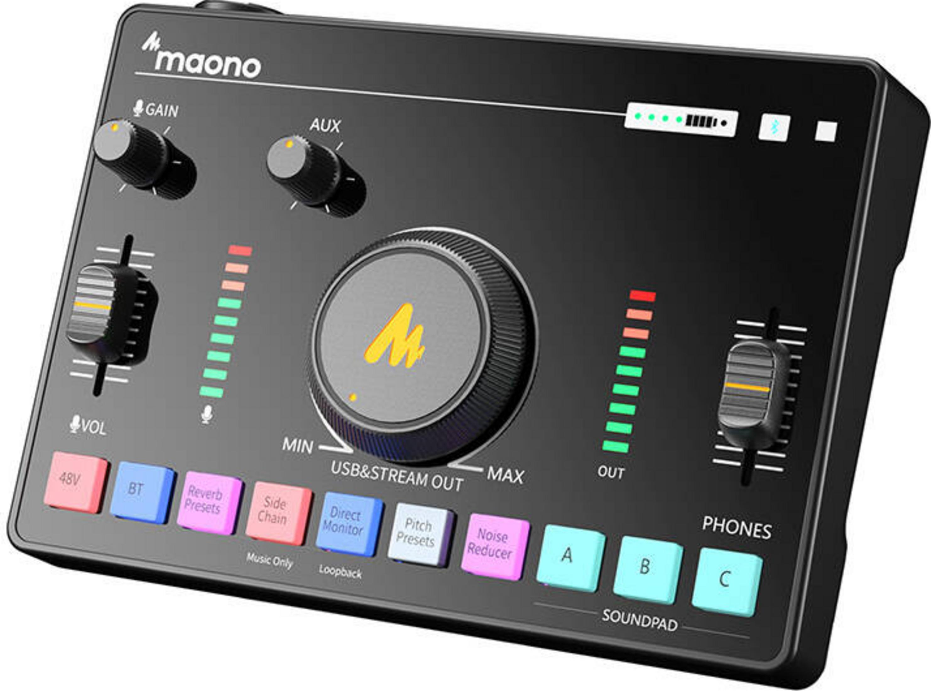 Black audio mixer with knobs, sliders, and illuminated buttons. Features a large central dial.