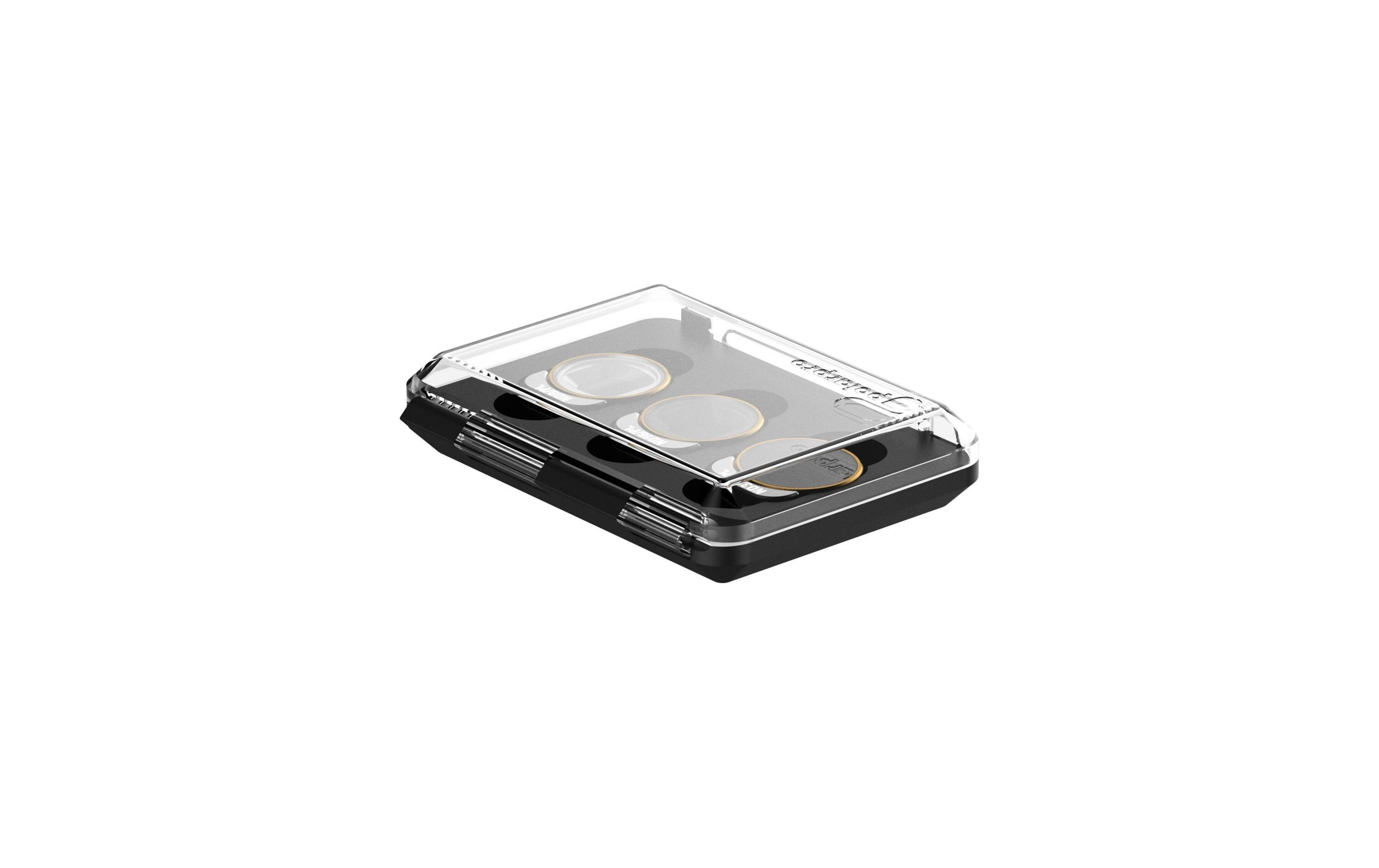 Ein schwarzes Gehäuse mit transparentem Deckel, das drei runde Filter enthält.