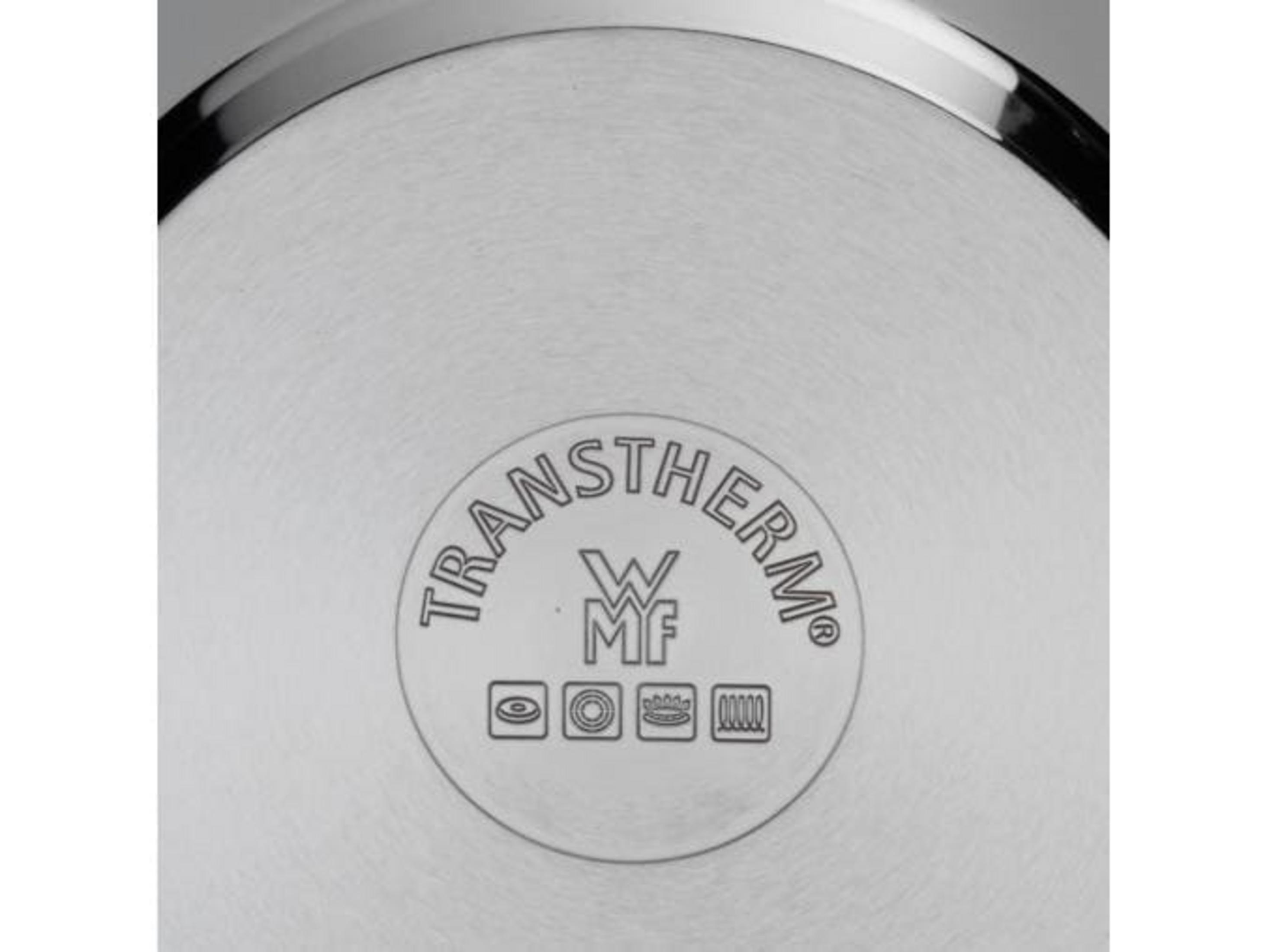Zbliżenie dna metalowej patelni z logo TRANSTHERM i symbolami.