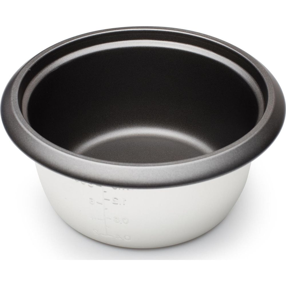 Une cuve blanche intérieure pour cuiseur à riz avec revêtement antiadhésif noir.