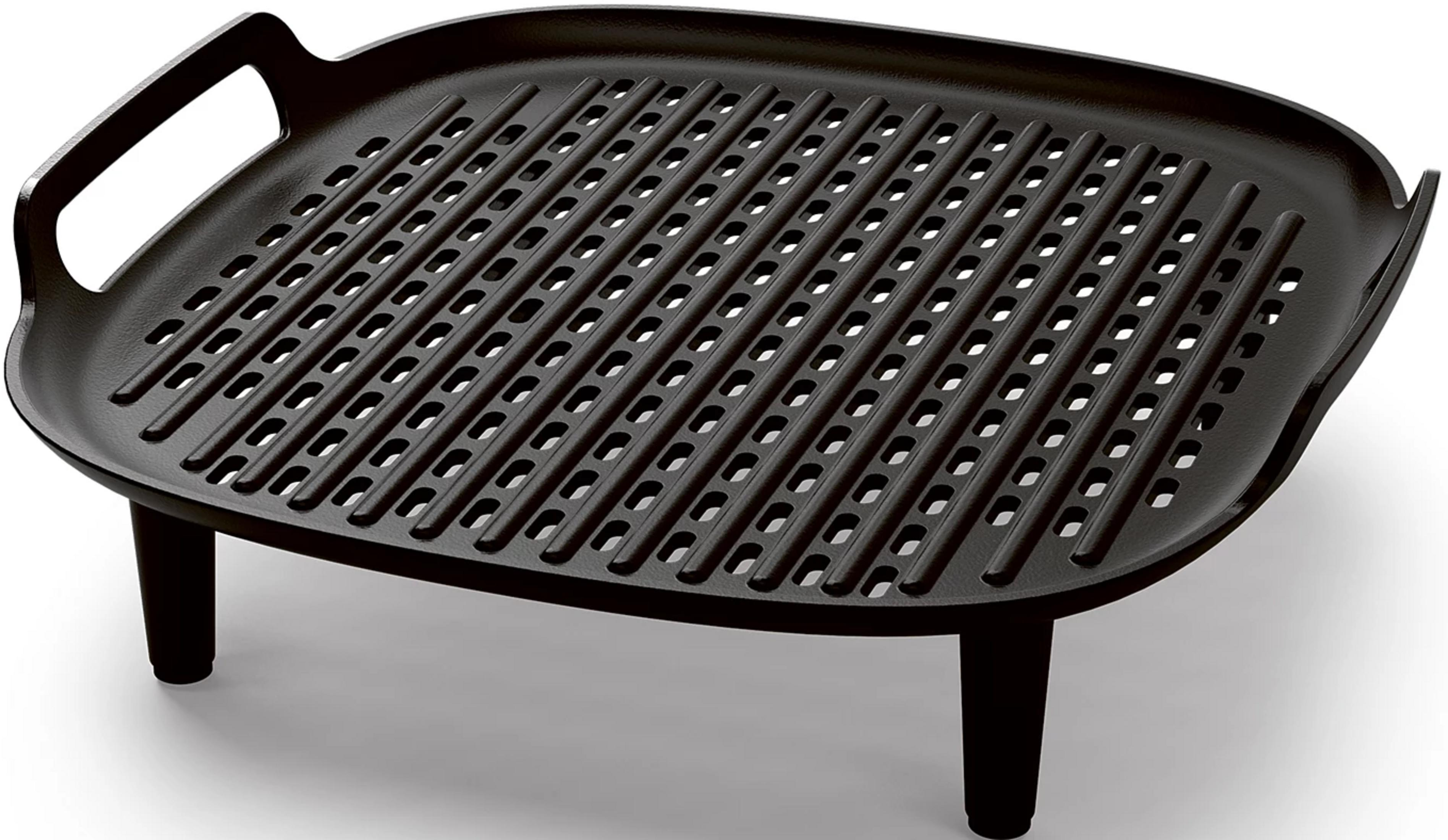Una piastra grill nera in ghisa con manici e gambe.