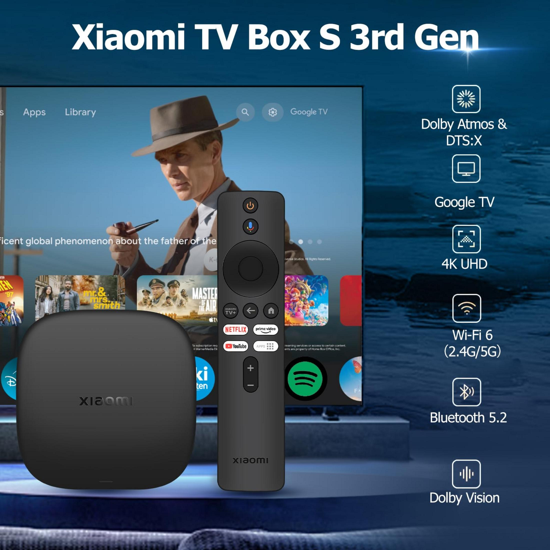 Xiaomi TV Box S 3rd Gen: Box, Fernbedienung, TV-Oberfläche mit Filmen.