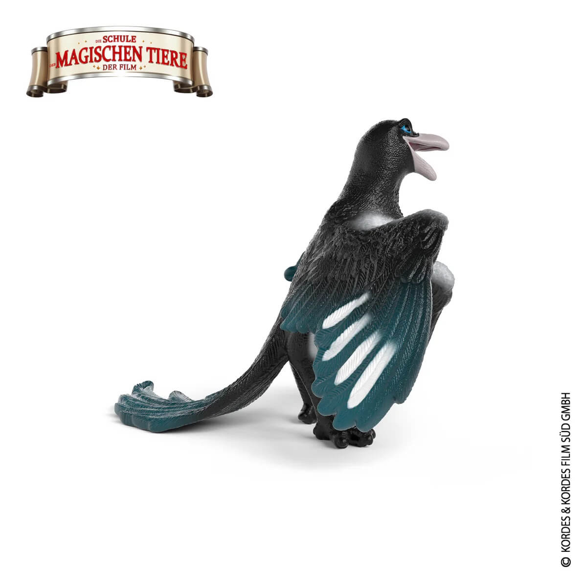 Ein schwarzer Vogel mit blauen Augen und weißen Streifen auf den Flügeln.