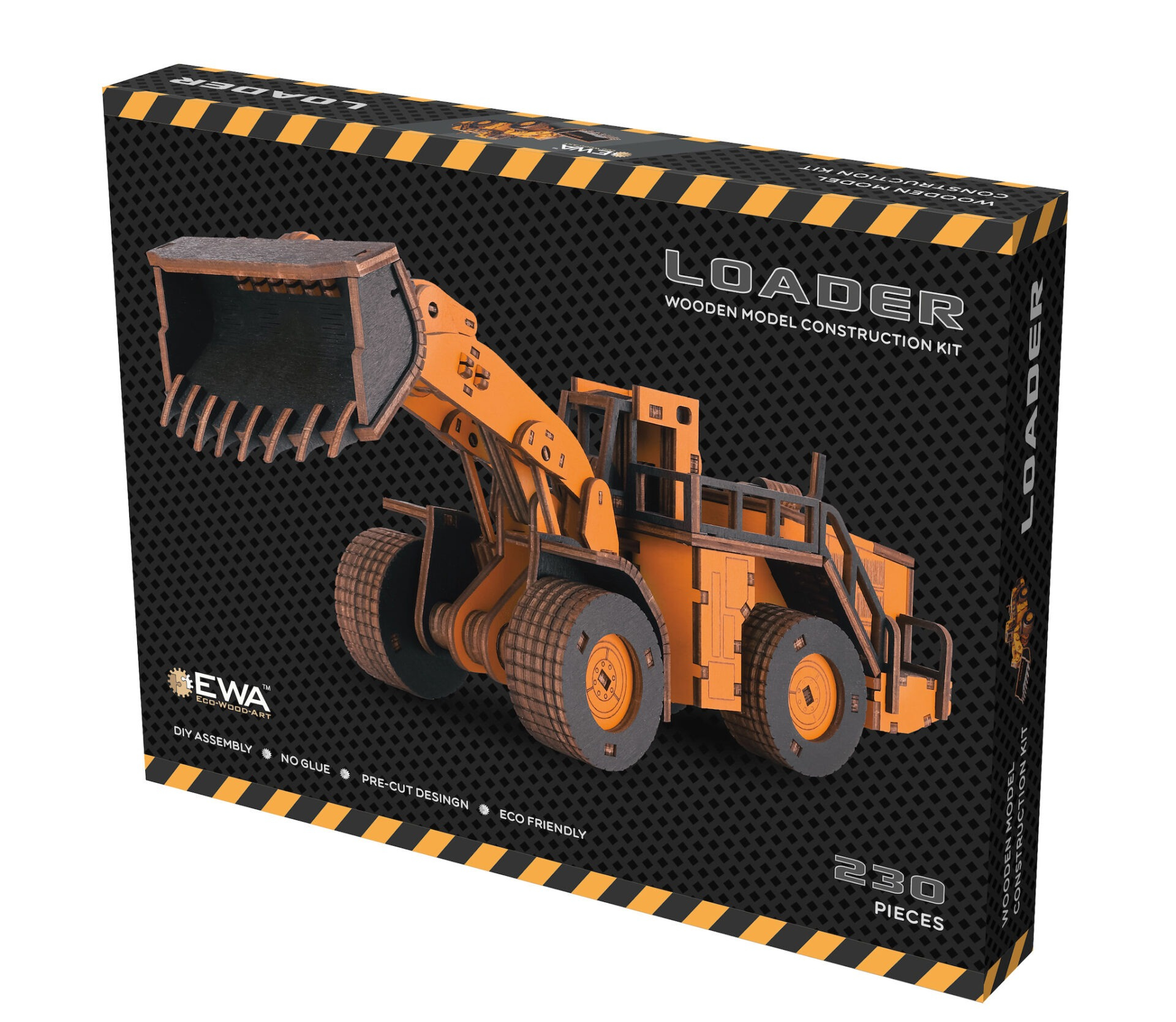 Orangefarbenes Holzmodell eines Radladers auf schwarzem Karton mit gelben Warnstreifen.