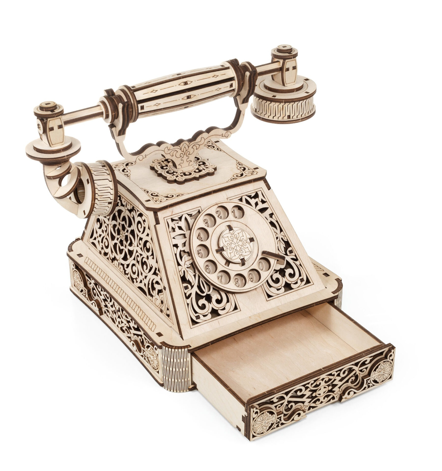 Ein Holzmodell eines Vintage-Telefons mit detaillierten Schnitzereien und einer Schublade.