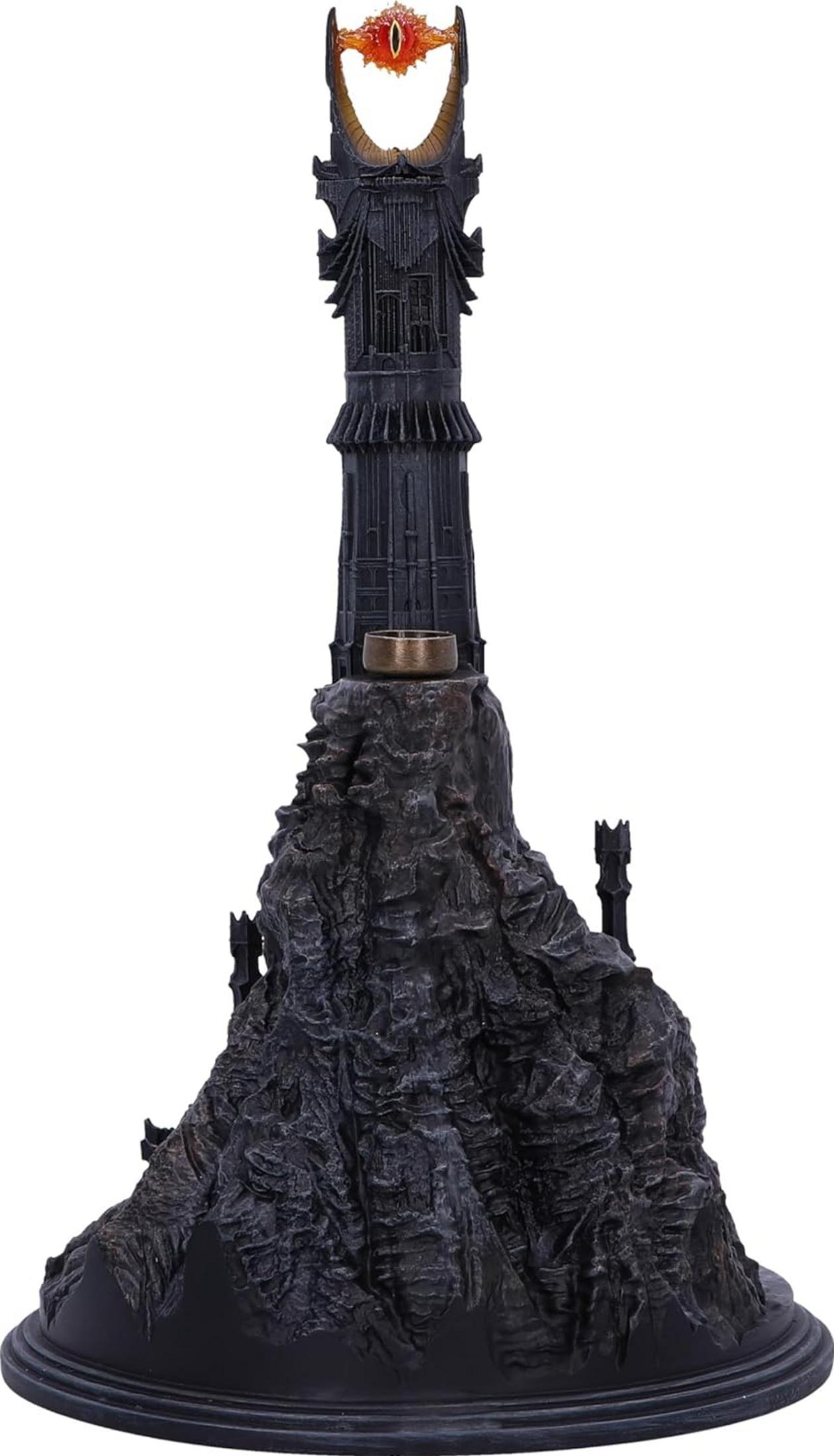 Donkere toren met een oog bovenop en een ring op de rots.