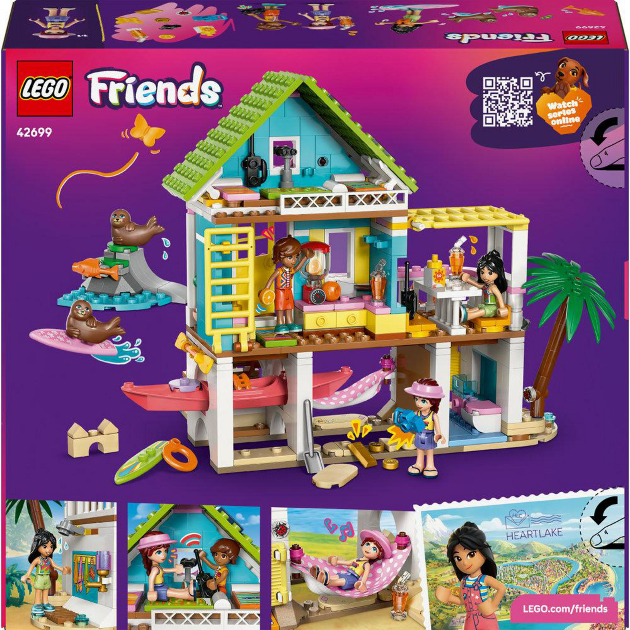 Kolorowy dom Lego Friends z postaciami, deskami surfingowymi i fokami nad morzem.