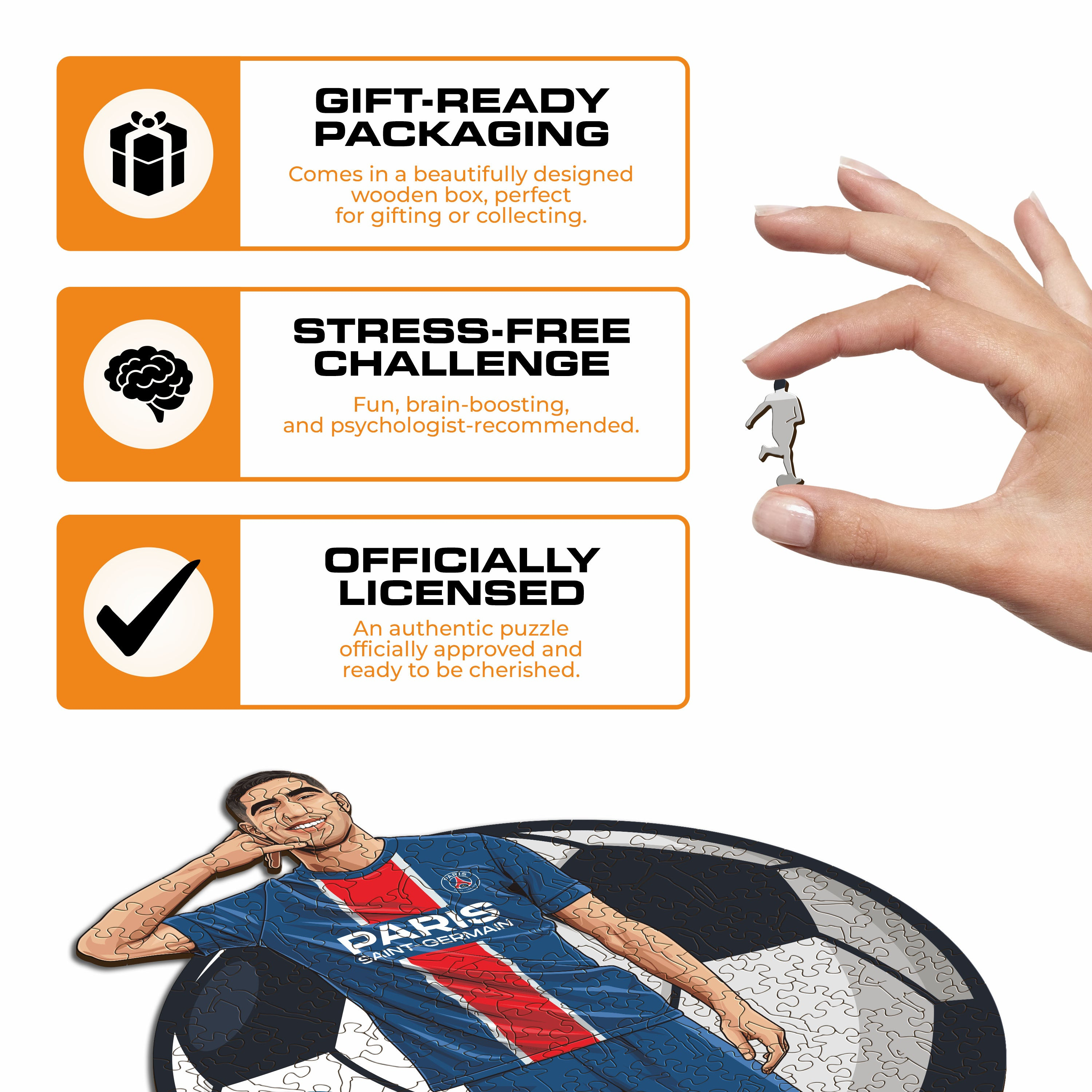 Eine Hand hält ein kleines Puzzleteil eines Fußballspielers im PSG-Trikot mit Text über das Puzzle.