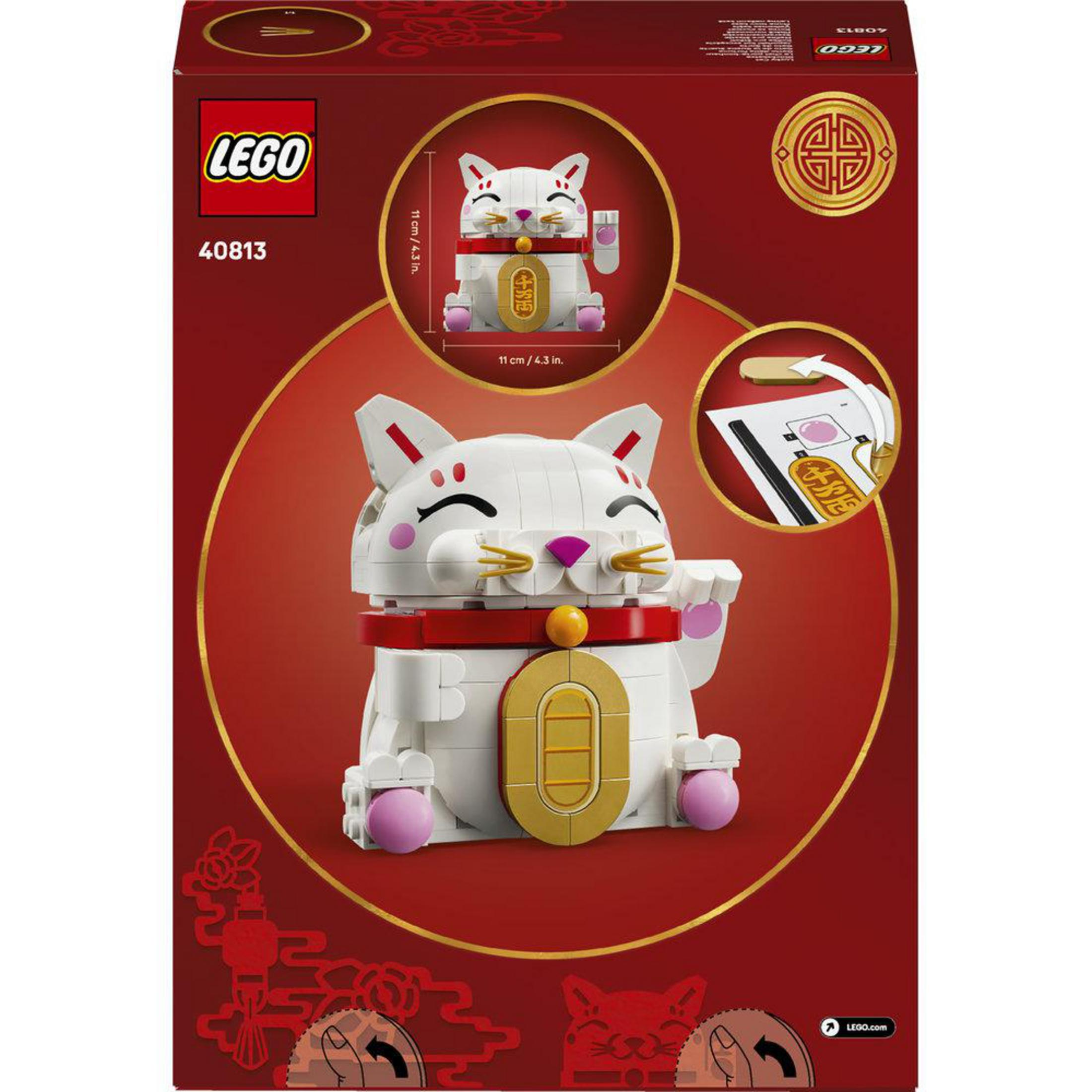 LEGO kit verpakking met een witte gelukskat met rode accenten.