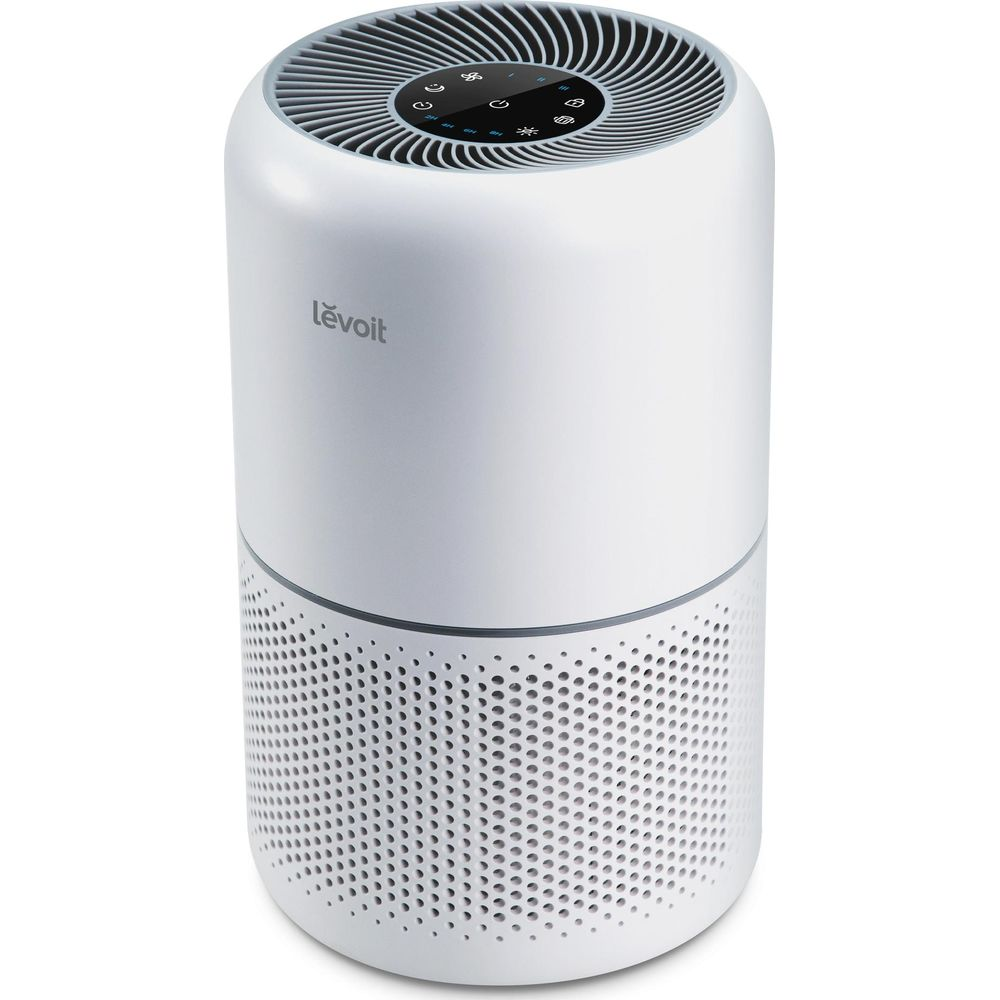 Biały oczyszczacz powietrza Levoit z otworami wentylacyjnymi na górze i na dole.