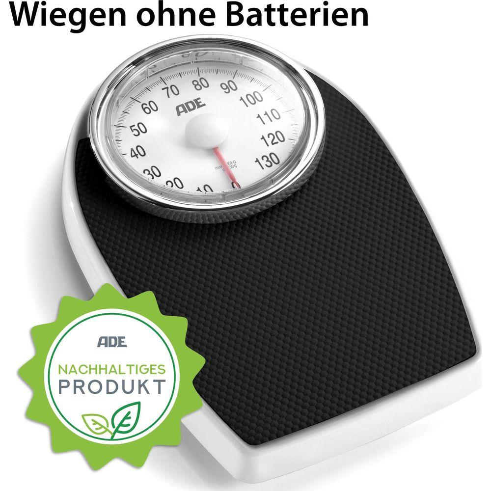 Biała waga łazienkowa z czarnym bieżnikiem i okrągłą tarczą.