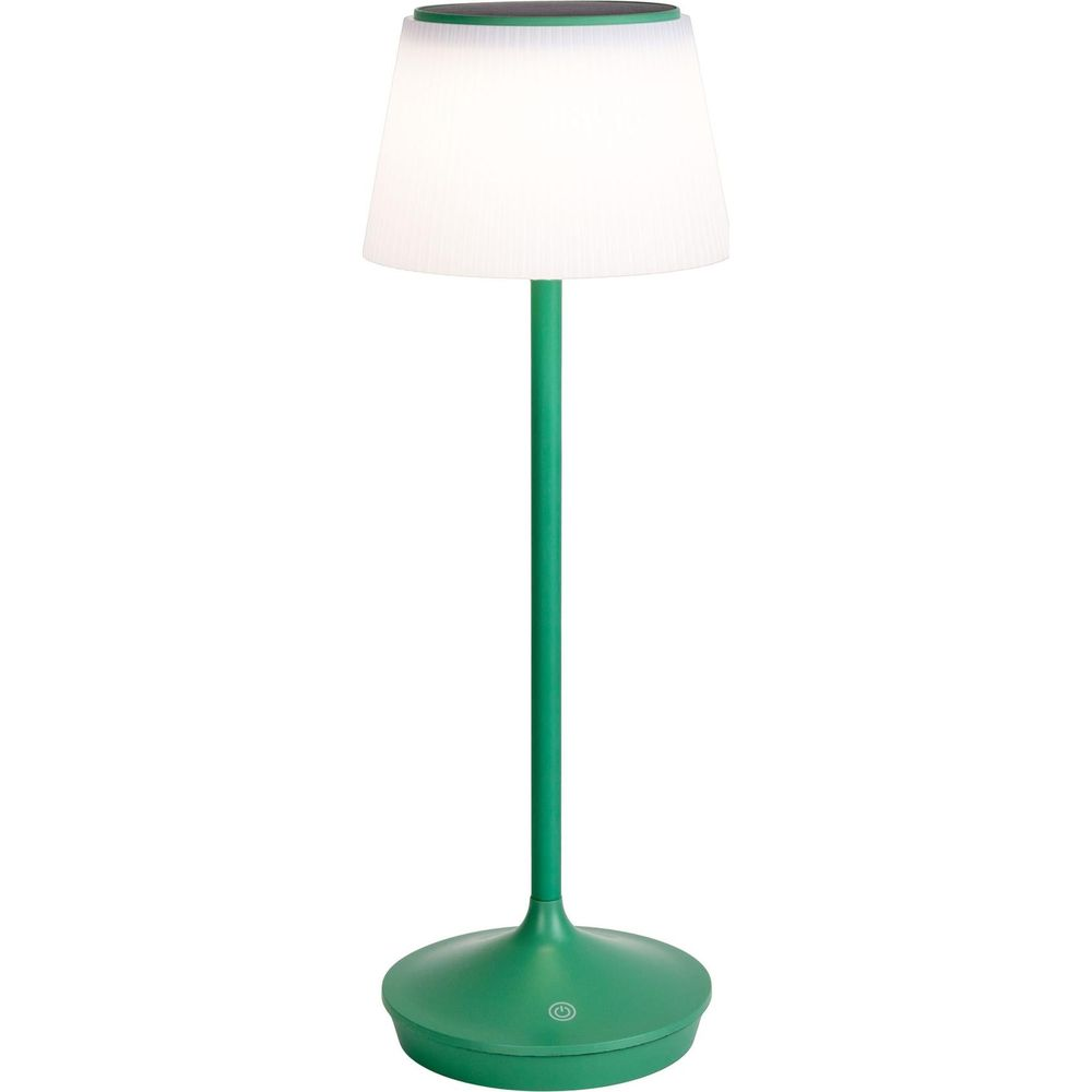 Ein grüne Stehlampe mit weißem Schirm und runder Basis.