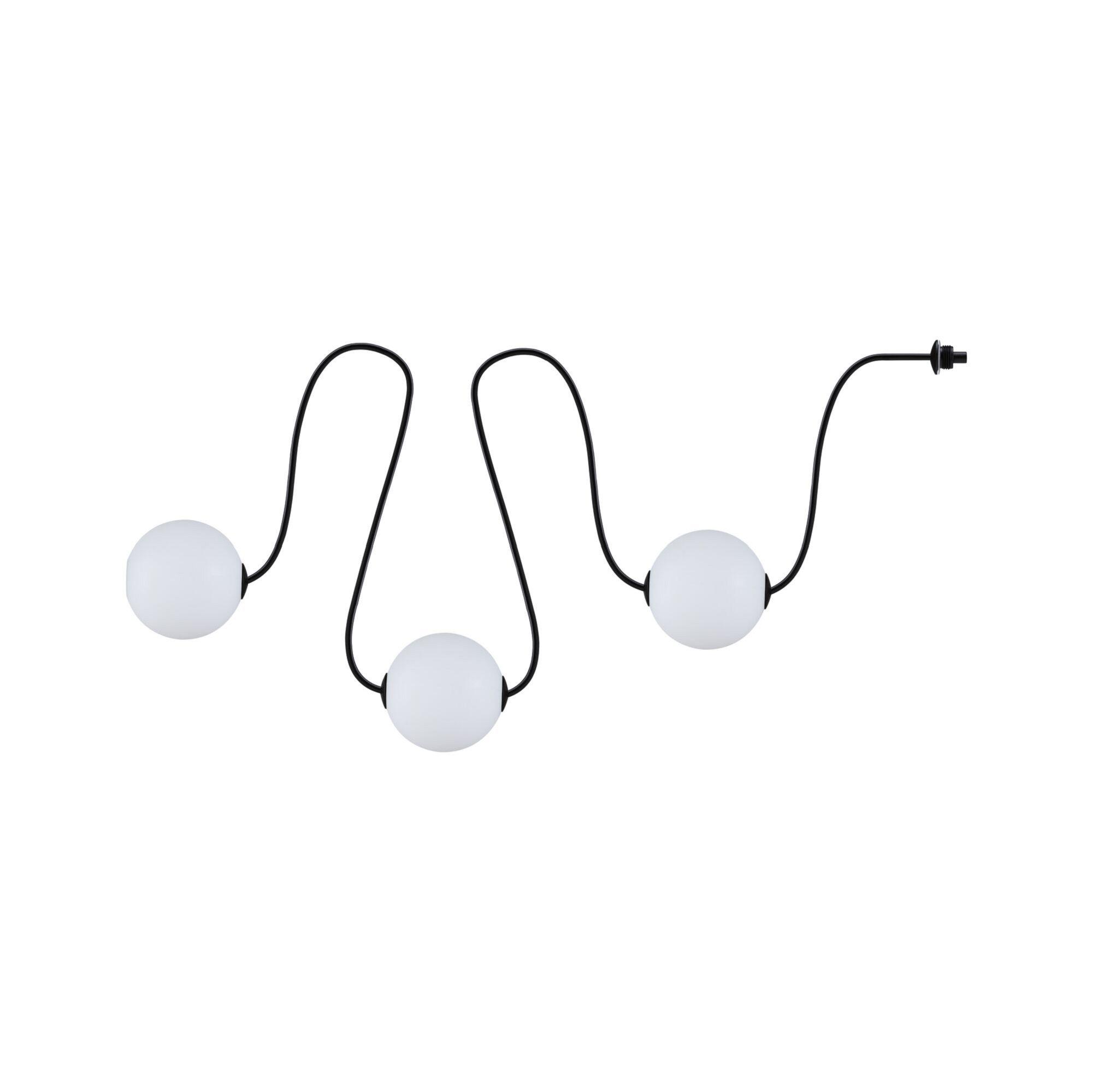 Czarny kabel z trzema białymi kulami w falistym układzie.