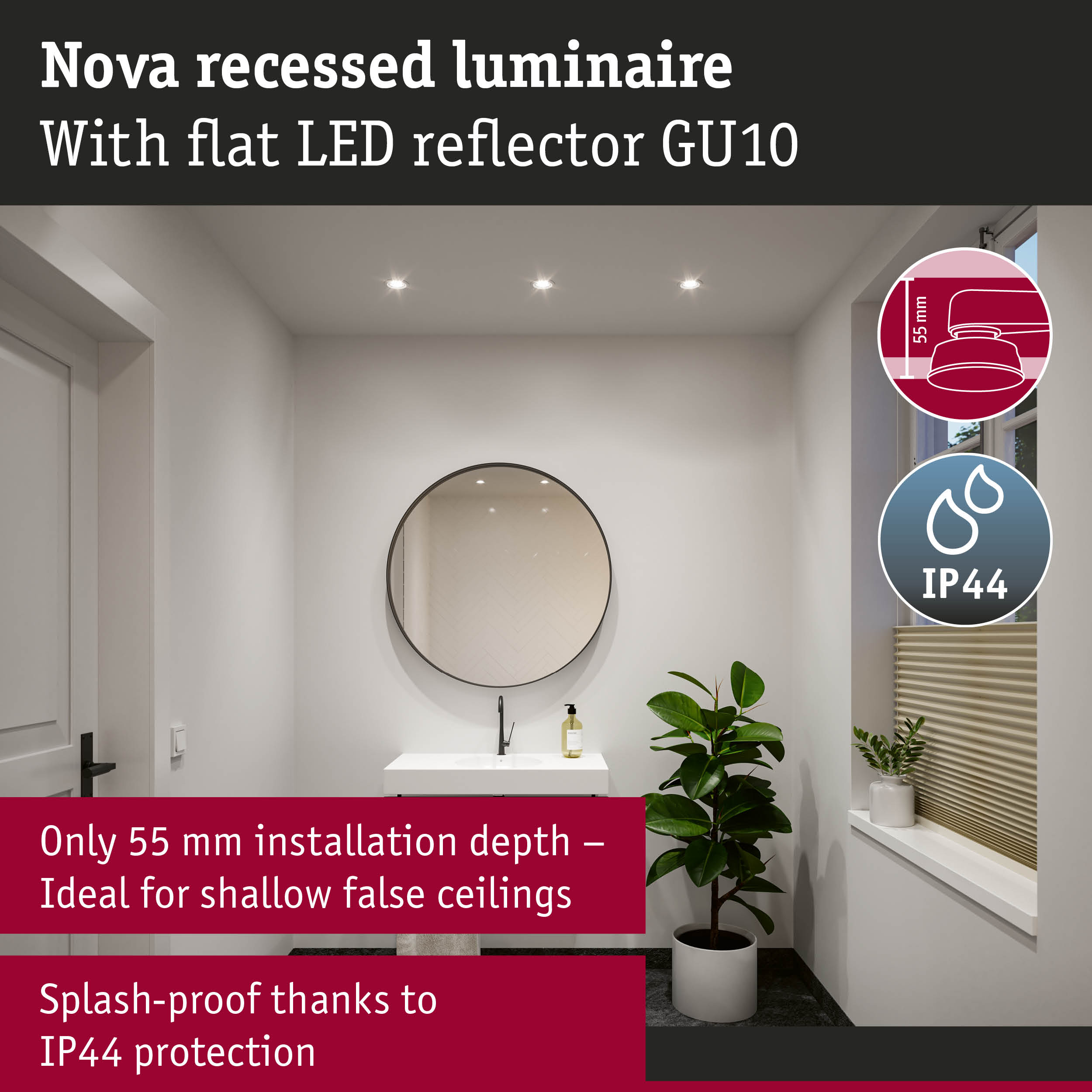 Łazienka z wpuszczanymi reflektorami, lustrem, umywalką i rośliną.