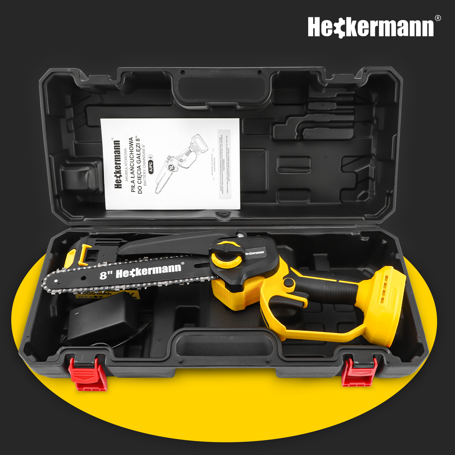 Żółto-czarna piła łańcuchowa z ładowarką i instrukcją w czarnym etui.