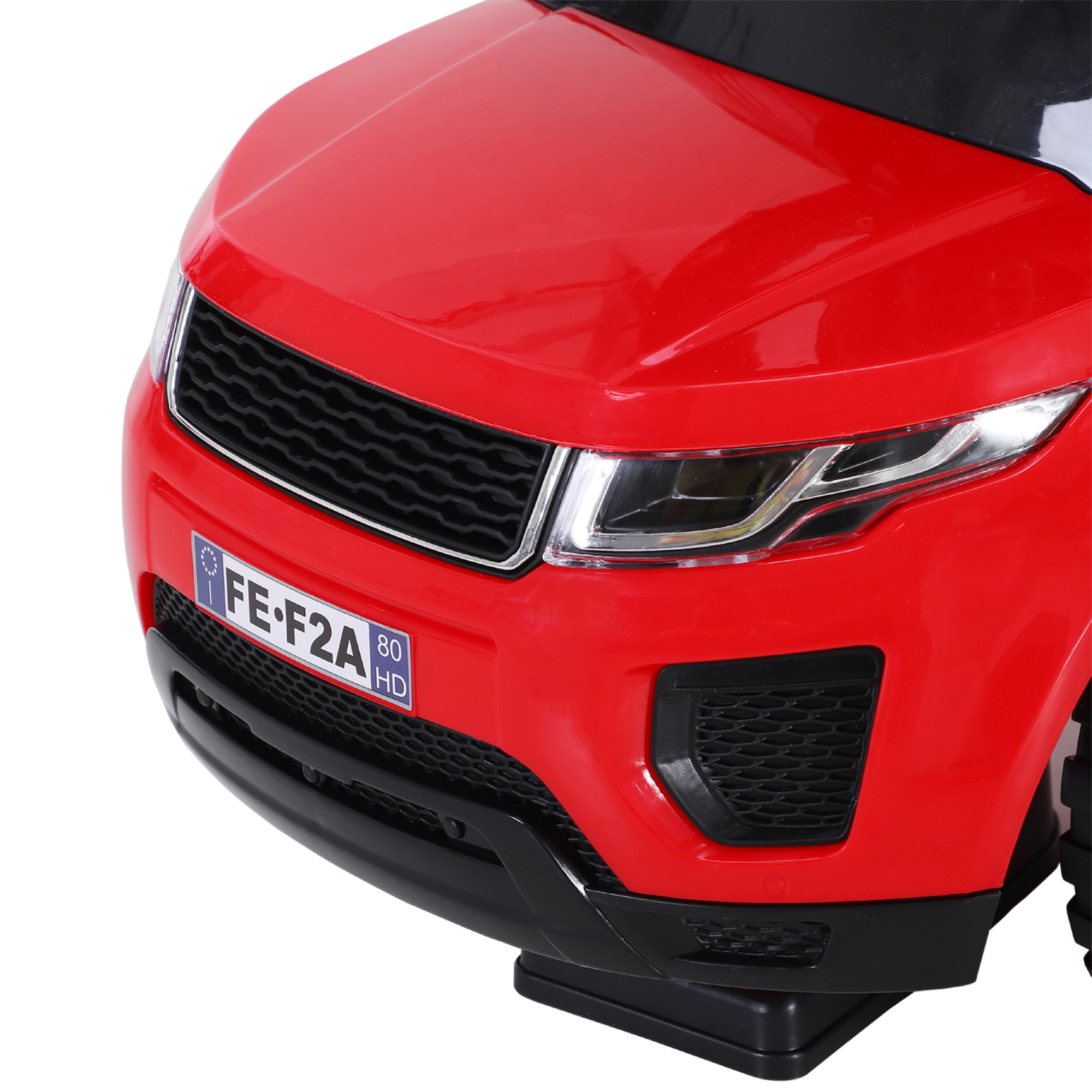 Vista frontal de un coche de juguete rojo con matrícula FE-F2A.