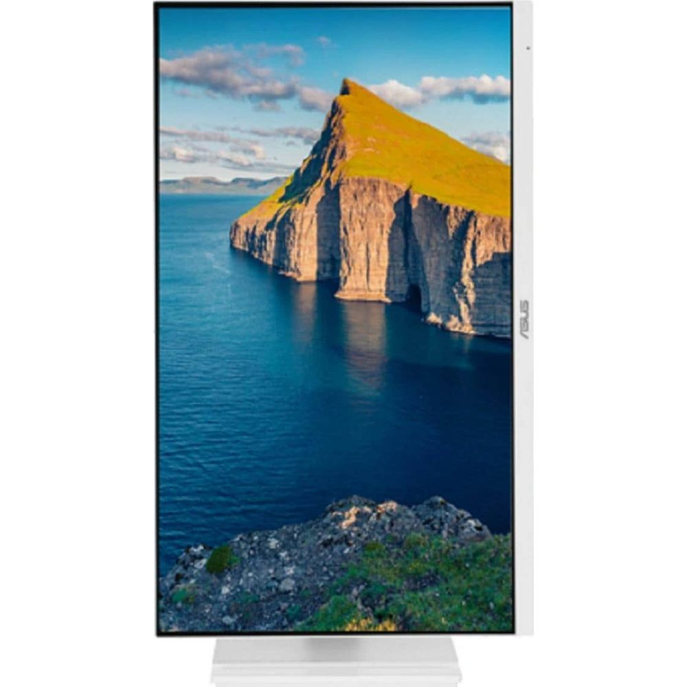 Monitor wyświetla krajobraz z zielonym szczytem góry i niebieską wodą.