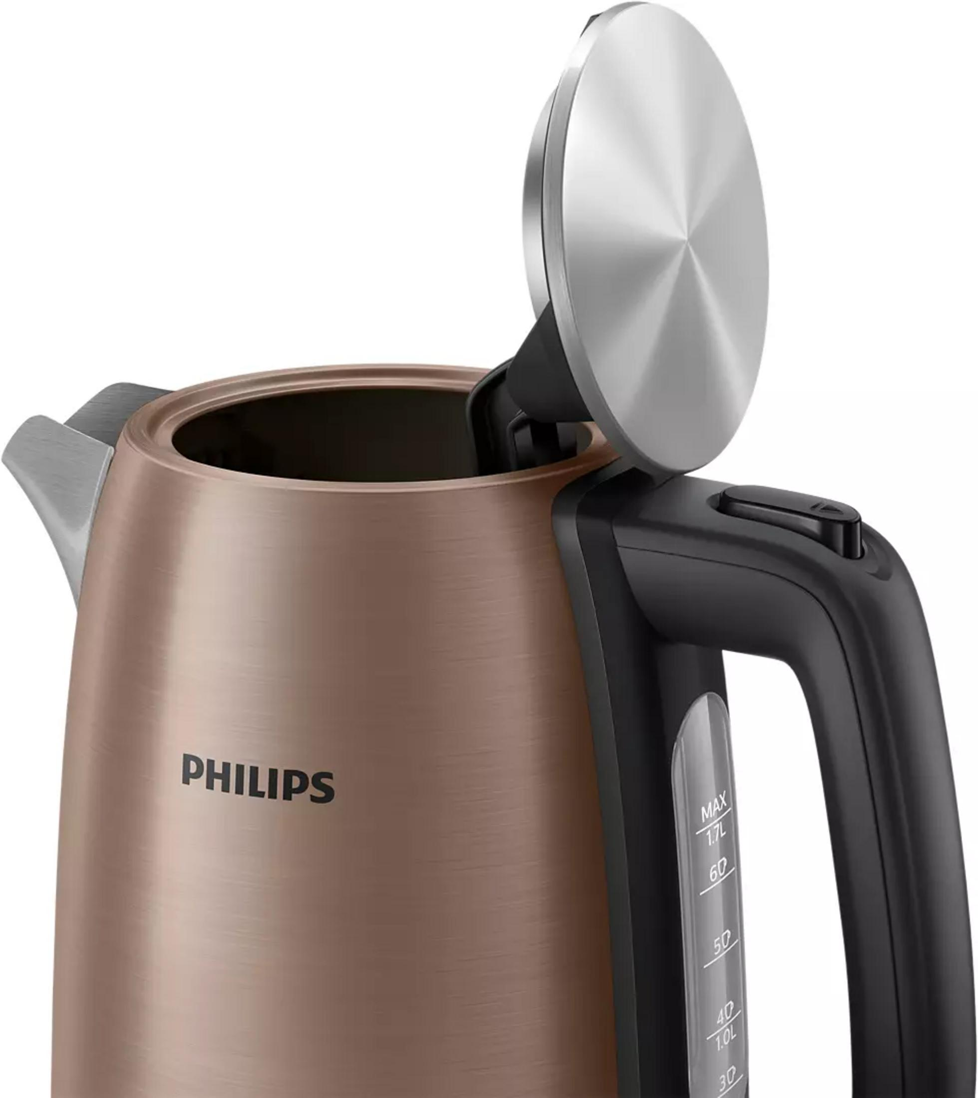 Eine bronzefarbene Philips-Kanne mit offenem Deckel und schwarzem Griff.